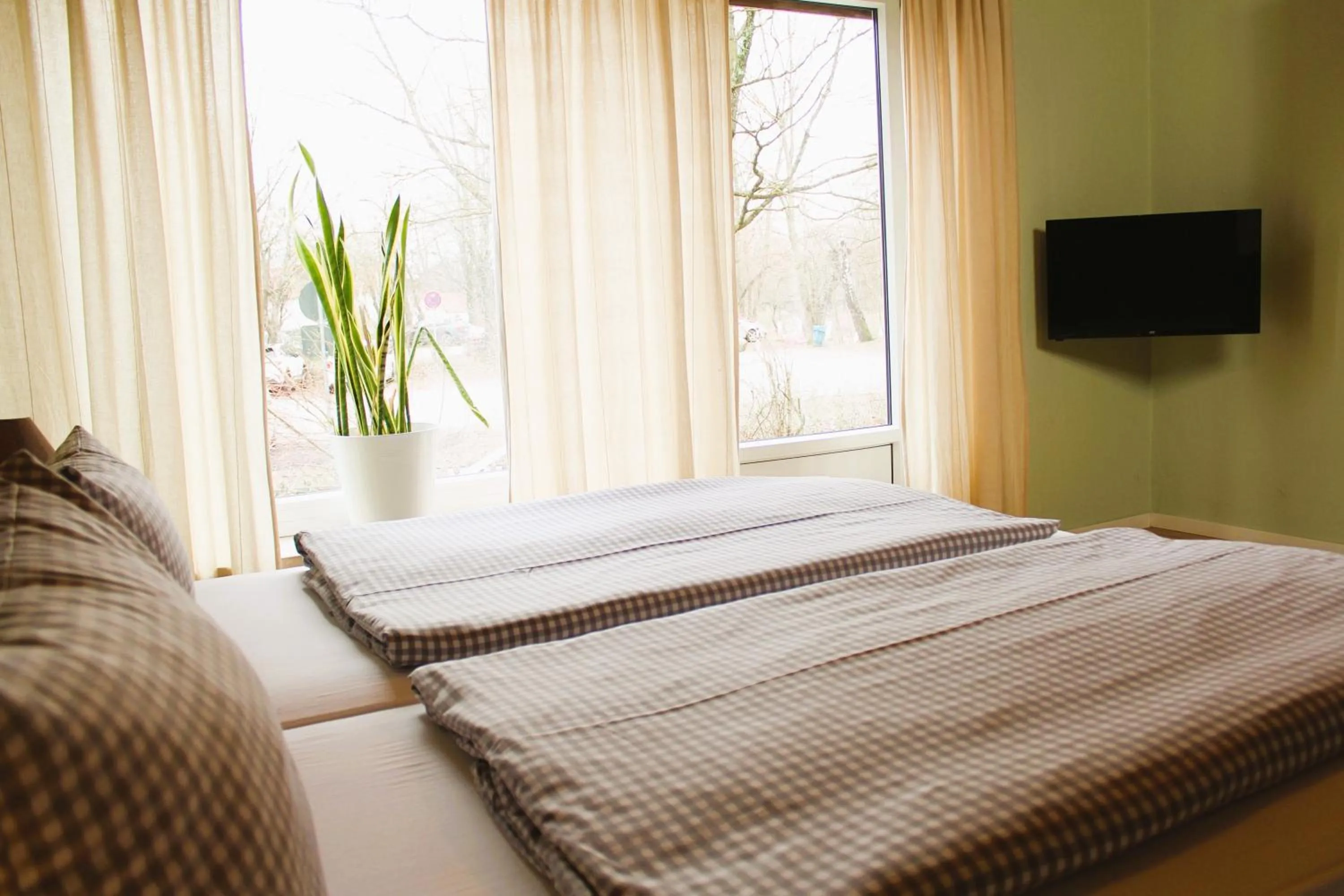 Photo of the whole room, Bed in ARRIVEL Pension Haus am Bach