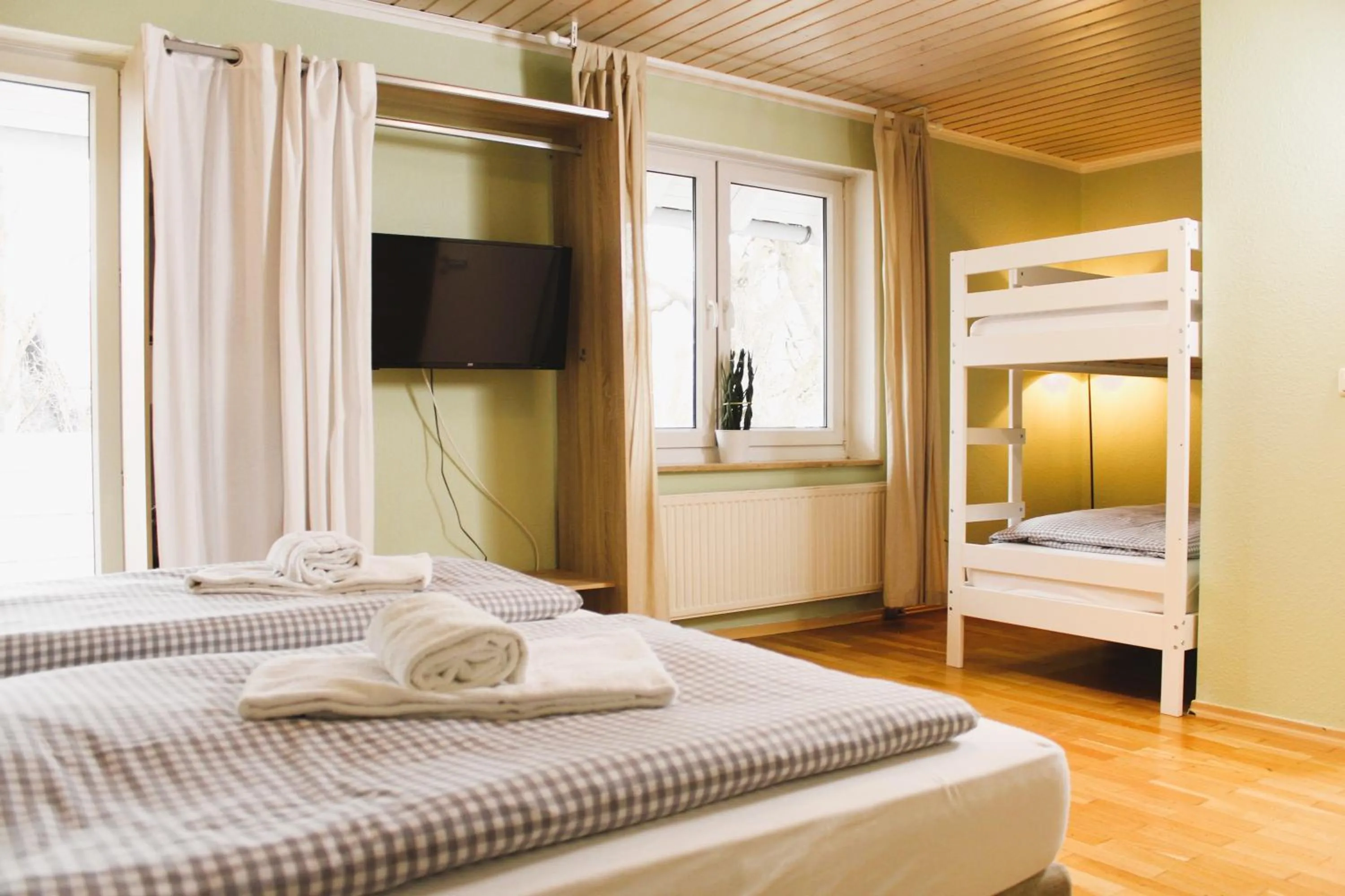 Photo of the whole room, Bed in ARRIVEL Pension Haus am Bach