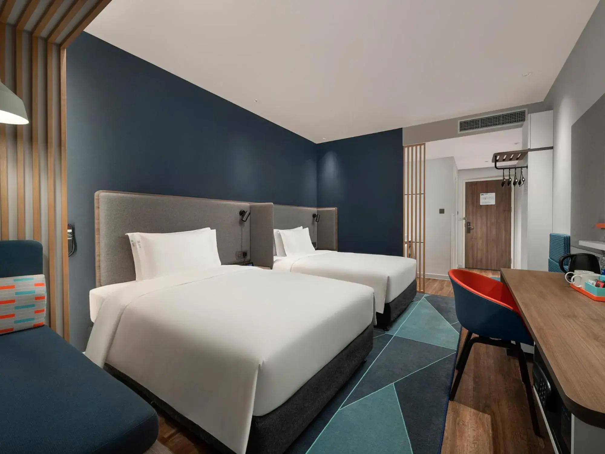Bed in Holiday Inn Express Changchun Jingyue by IHG Bed in Holiday Inn Express Changchun Jingyue by IHG