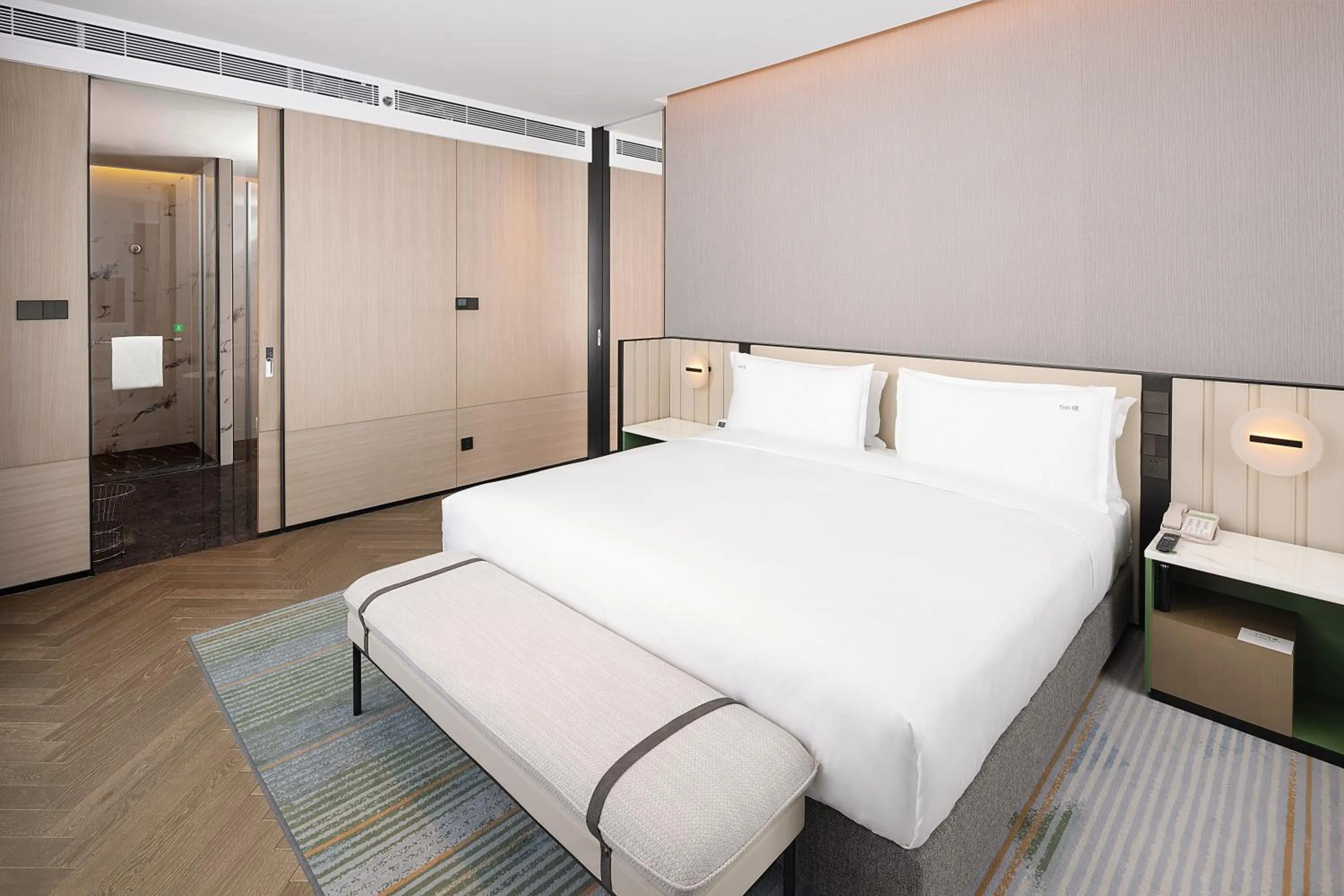 Bedroom, Bed in Holiday Inn & Suites Qingdao Jinshui by IHG