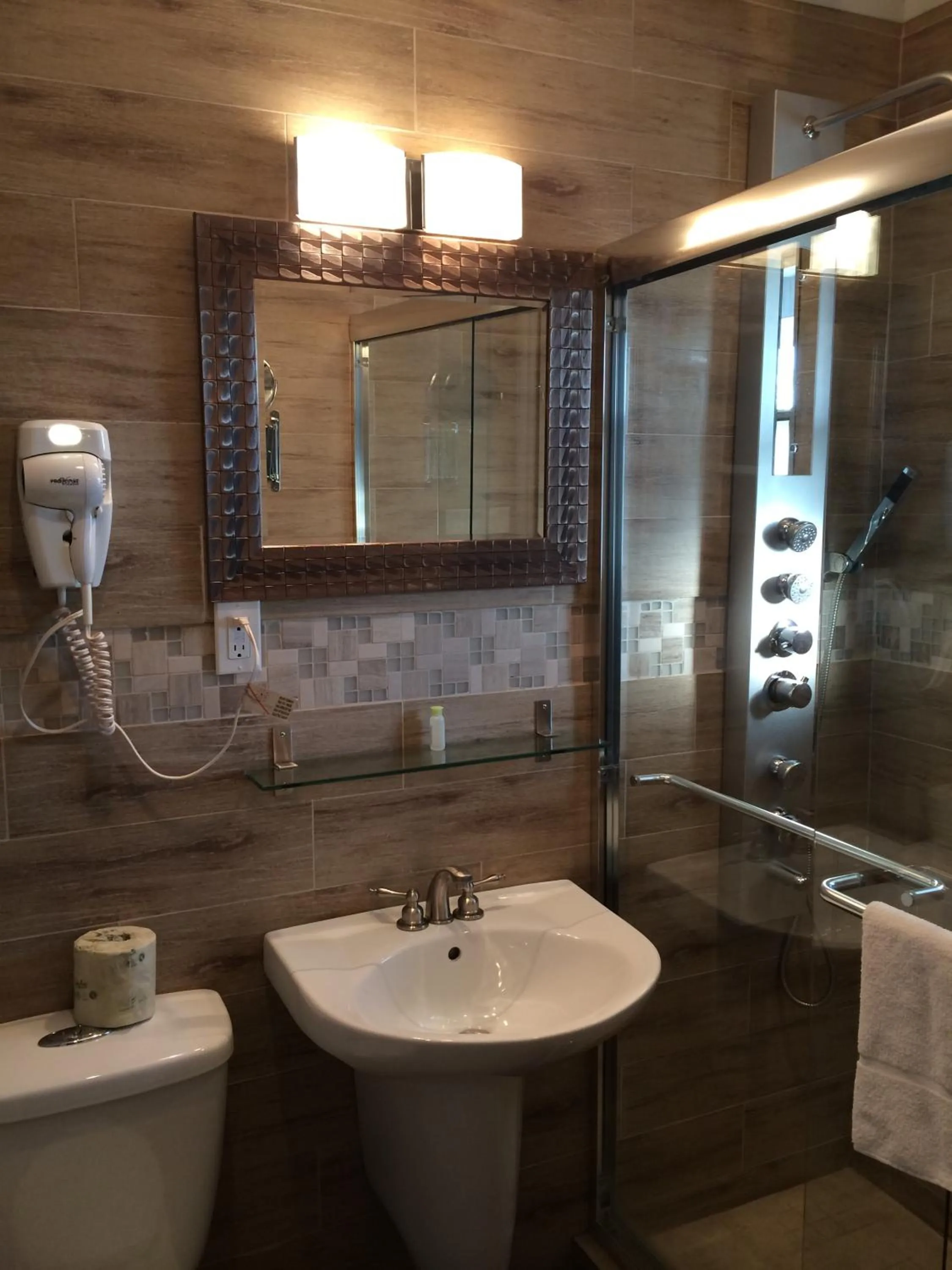 Bathroom in Olux Hotel-Motel-Suites