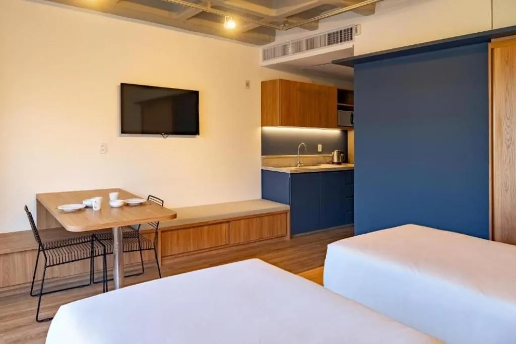 Photo of the whole room, Bed in Atrium Studios by Xtay - Conforto em Palhoça, a poucos metros da praia