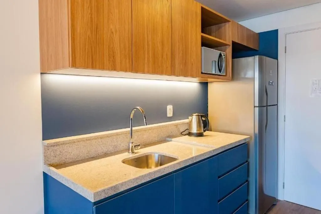 Kitchen or kitchenette in Atrium Studios by Xtay - Conforto em Palhoça, a poucos metros da praia