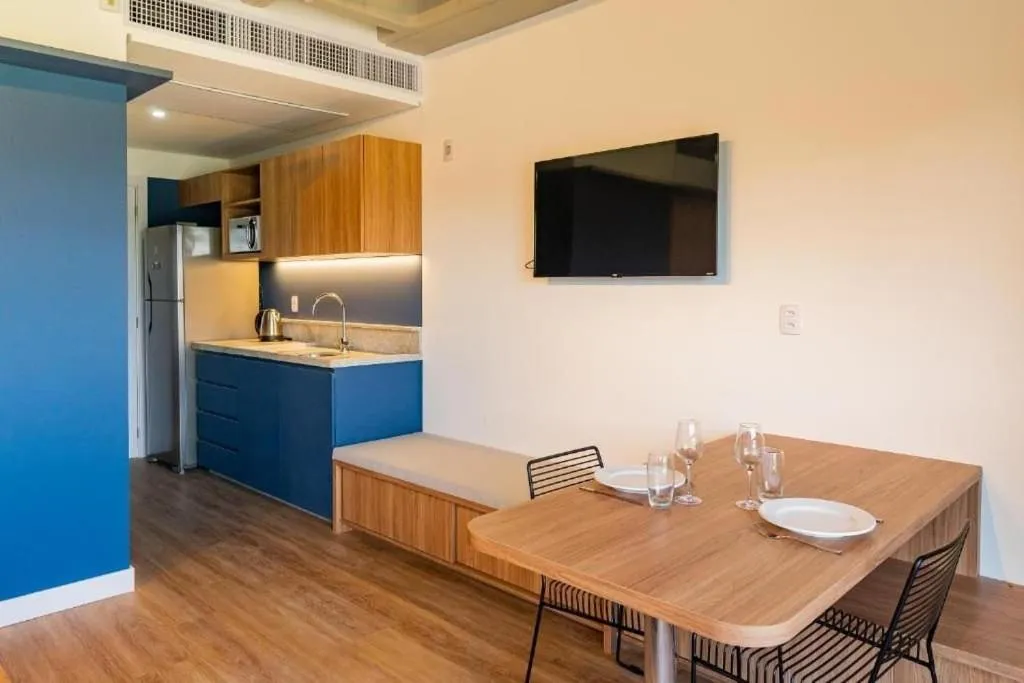 Kitchen or kitchenette in Atrium Studios by Xtay - Conforto em Palhoça, a poucos metros da praia