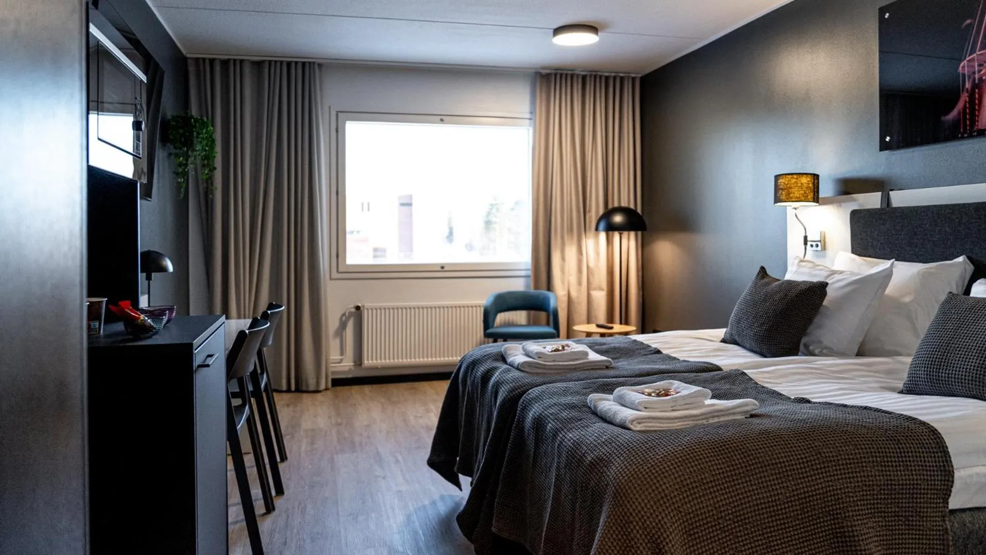 Bedroom, Bed in Hotelli Sointu by UHANDA