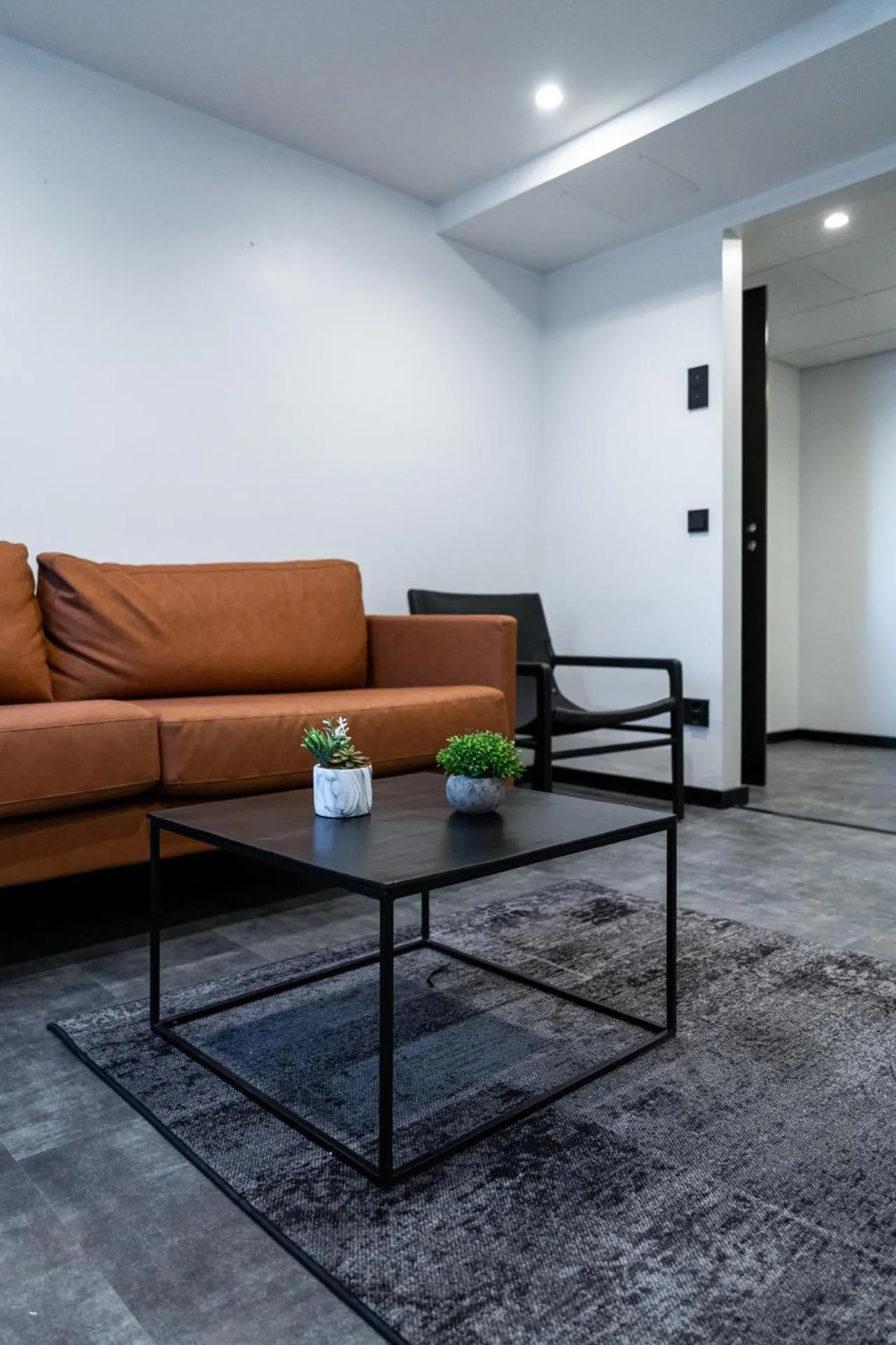 Living room in Hotelli Sointu by UHANDA