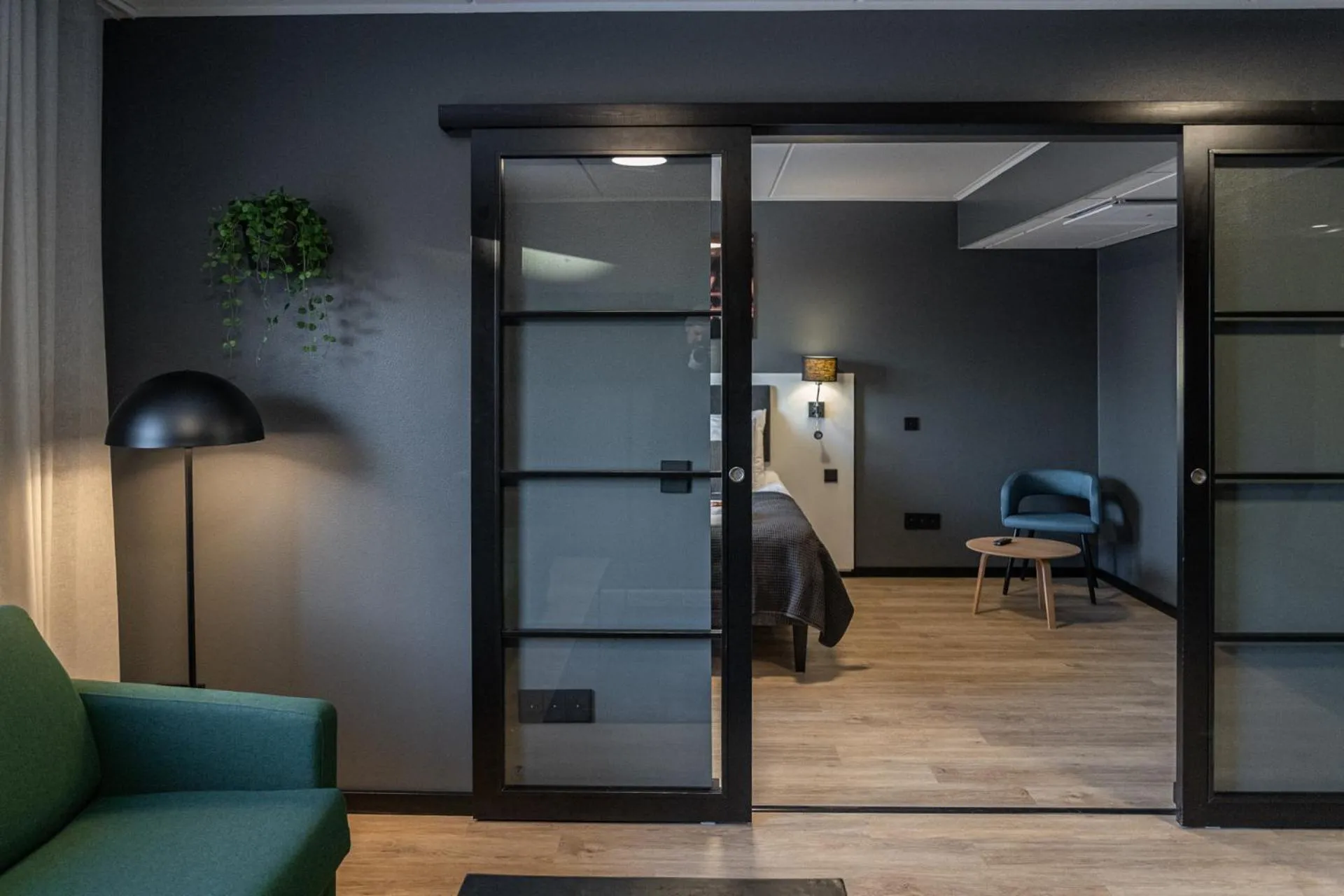 Living room in Hotelli Sointu by UHANDA