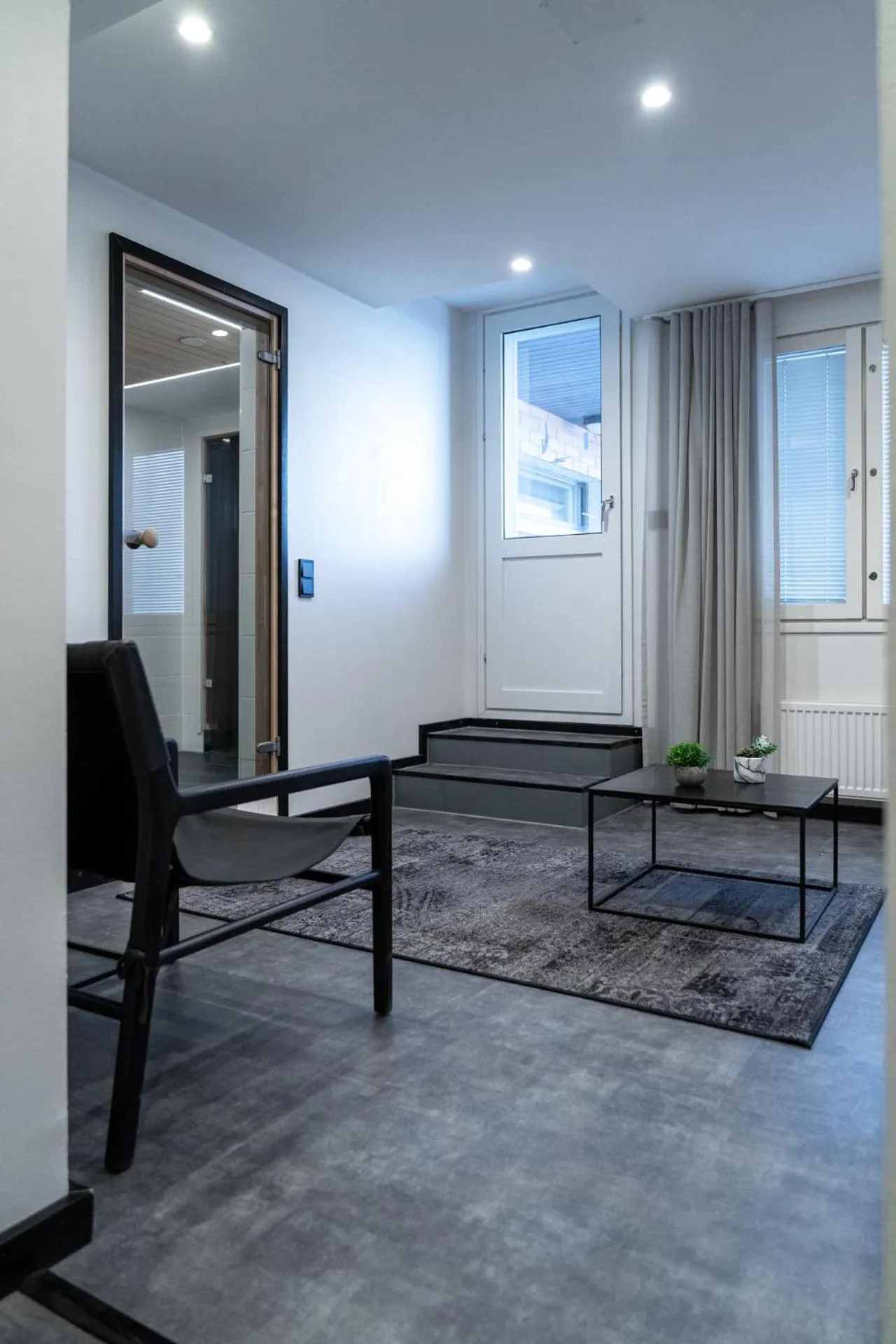 Living room in Hotelli Sointu by UHANDA