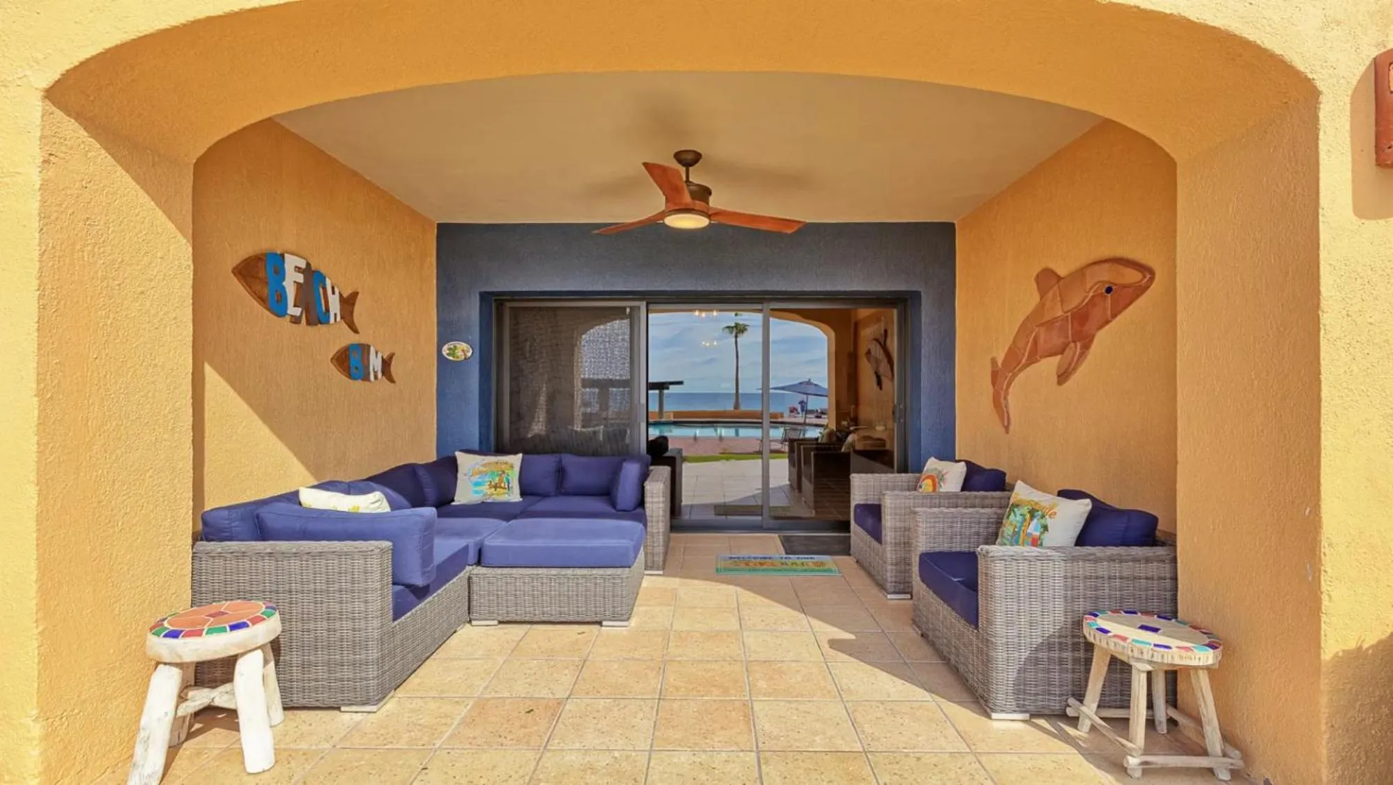 Patio in Ground Floor 2BR Beachfront - Steps to Pool - Princesa E104 - BeachBumCondos