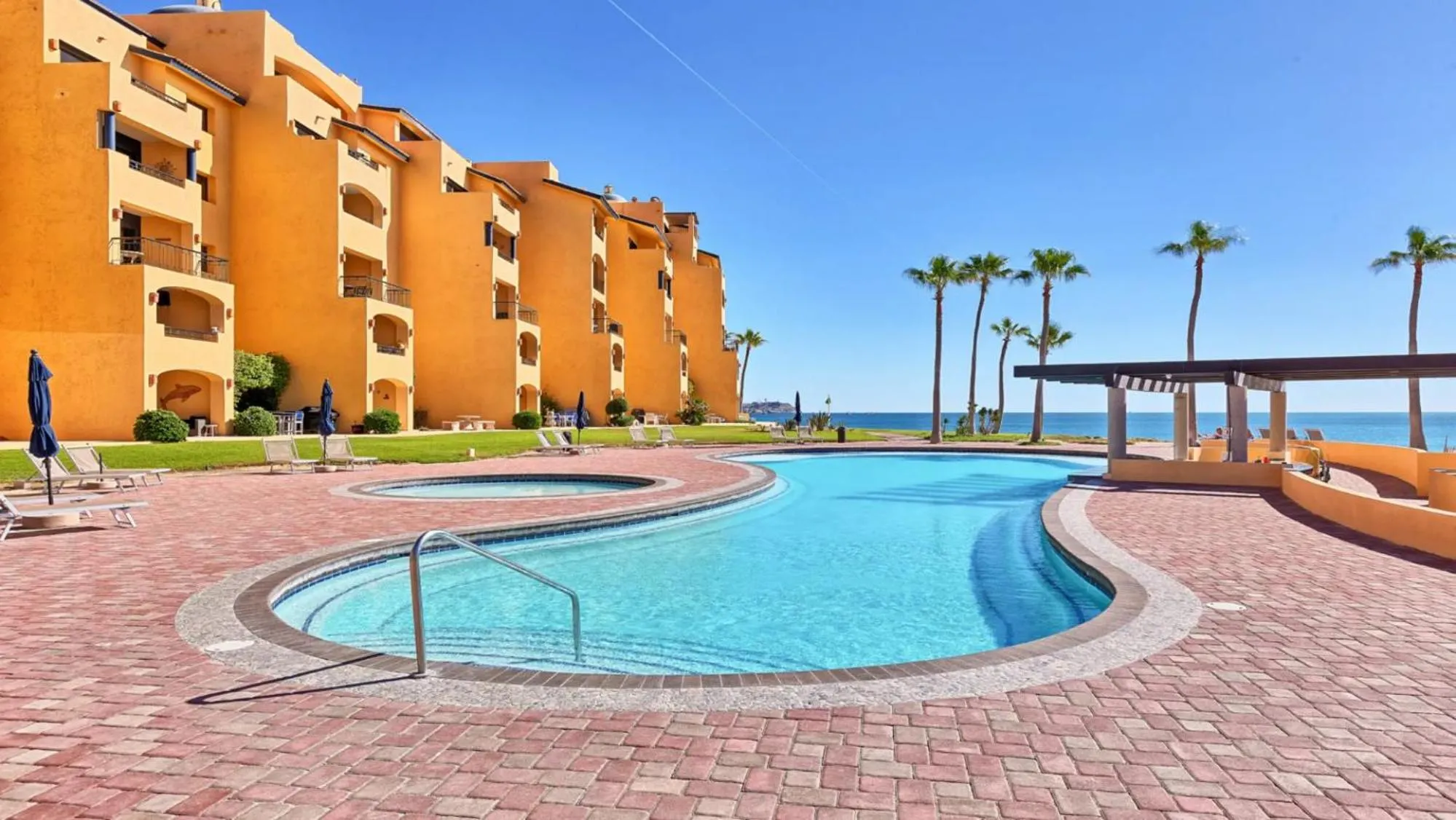 Swimming pool in Ground Floor 2BR Beachfront - Steps to Pool - Princesa E104 - BeachBumCondos
