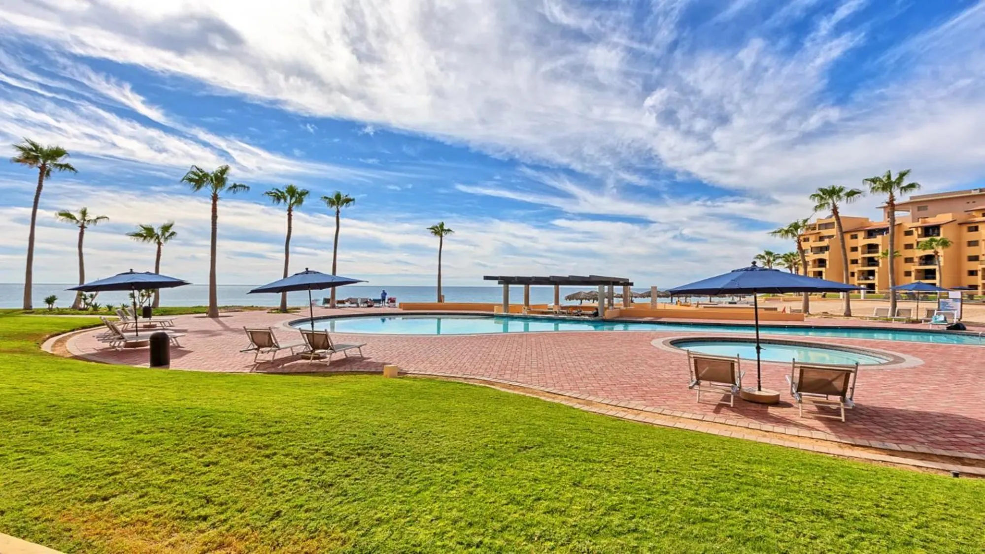 Two-Bedroom Apartment in Ground Floor 2BR Beachfront - Steps to Pool - Princesa E104 - BeachBumCondos