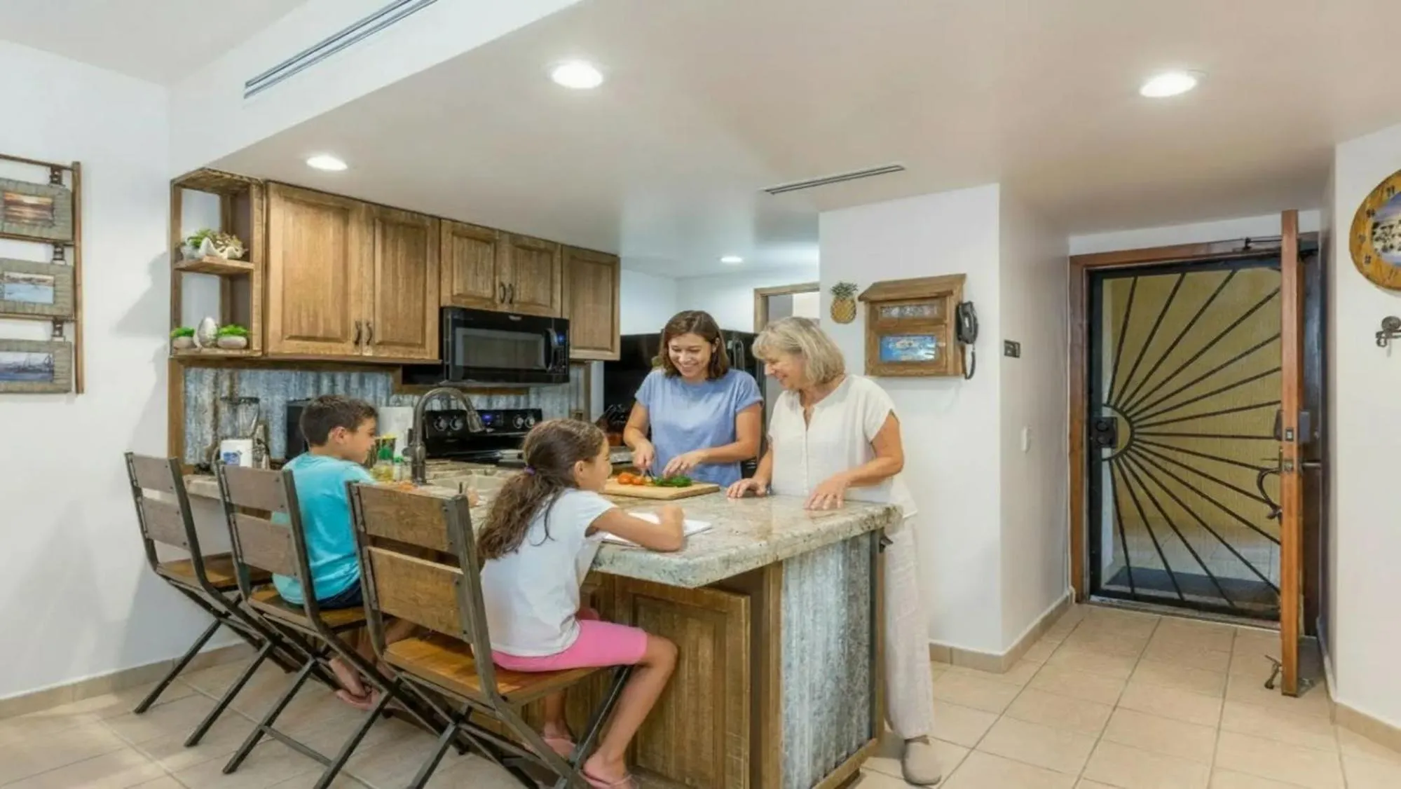 kitchen in Ground Floor 2BR Beachfront - Steps to Pool - Princesa E104 - BeachBumCondos