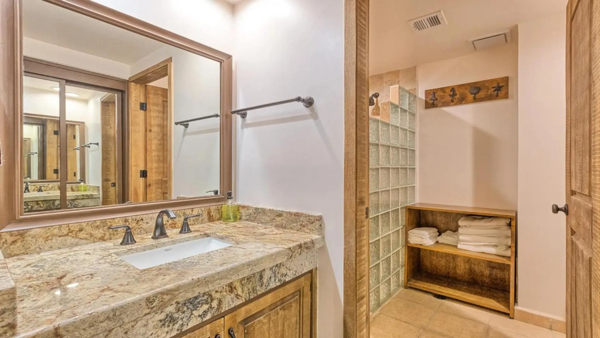 Bathroom in Ground Floor 2BR Beachfront - Steps to Pool - Princesa E104 - BeachBumCondos