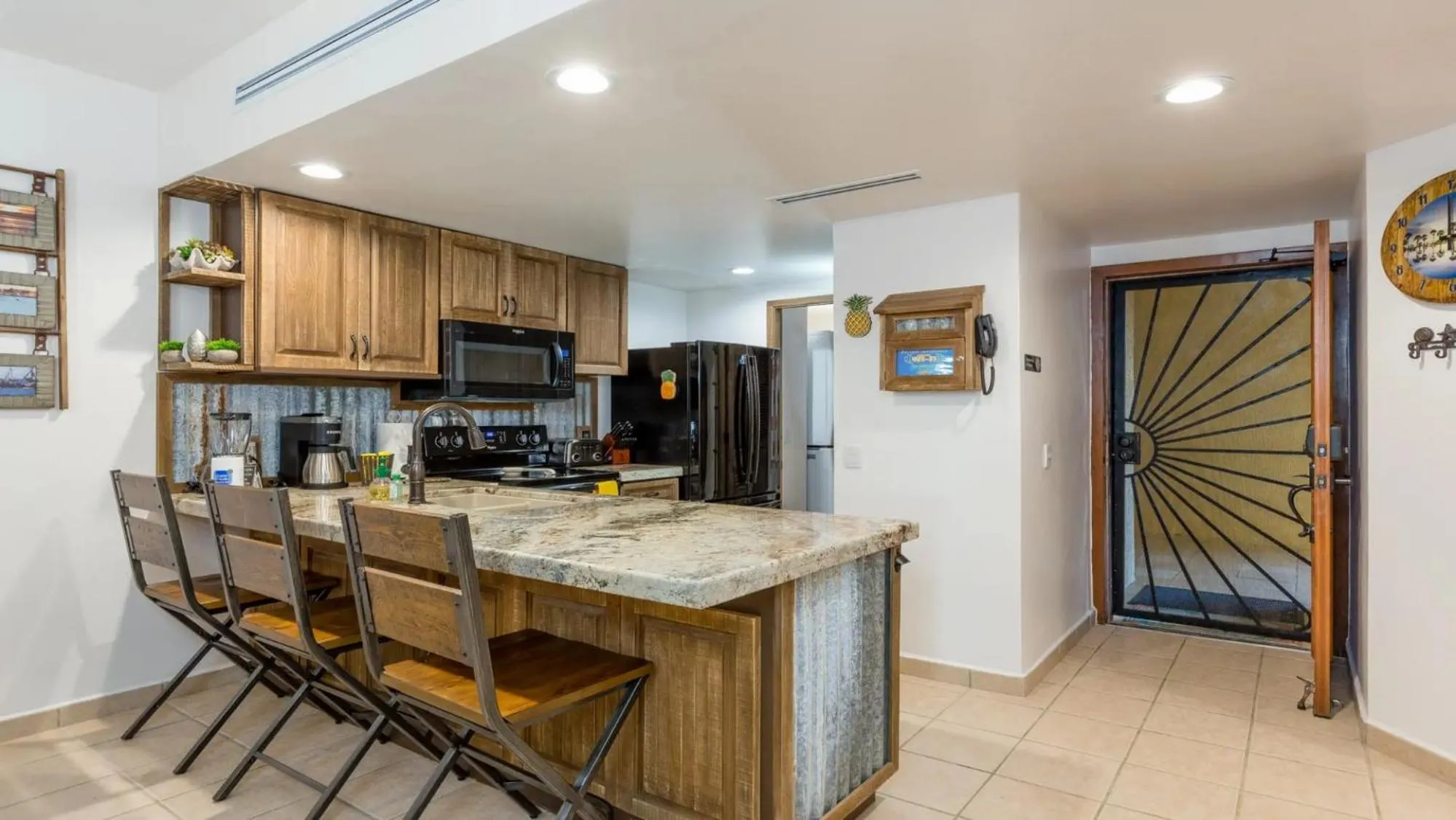 kitchen in Ground Floor 2BR Beachfront - Steps to Pool - Princesa E104 - BeachBumCondos
