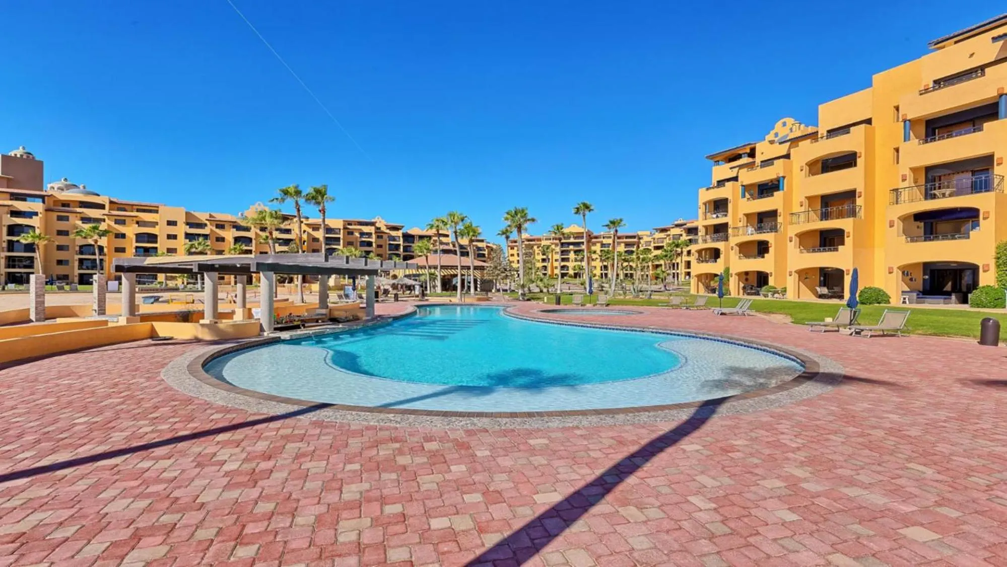Swimming pool in Ground Floor 2BR Beachfront - Steps to Pool - Princesa E104 - BeachBumCondos