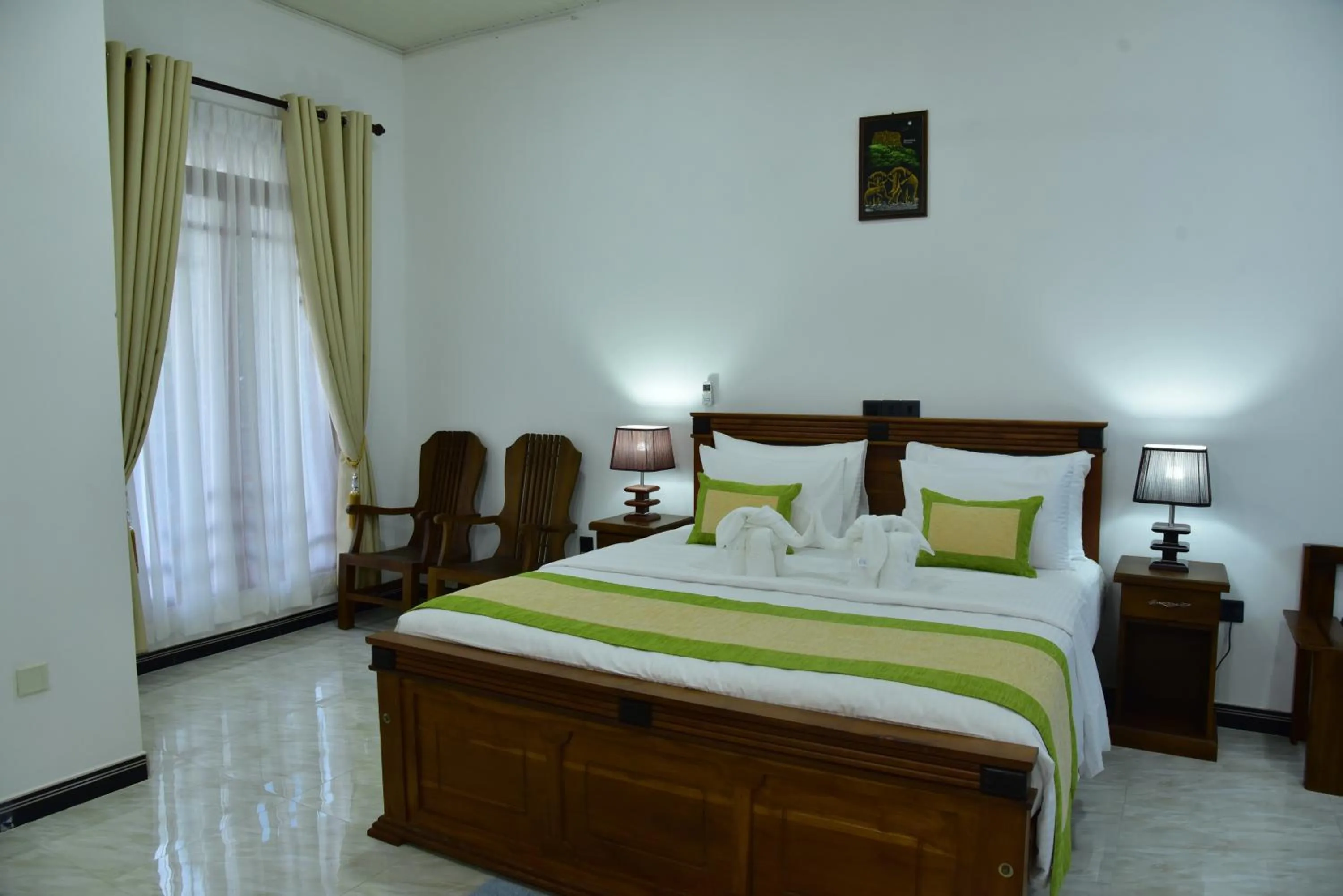 Bed in L S Lanka Hotel Dambulla