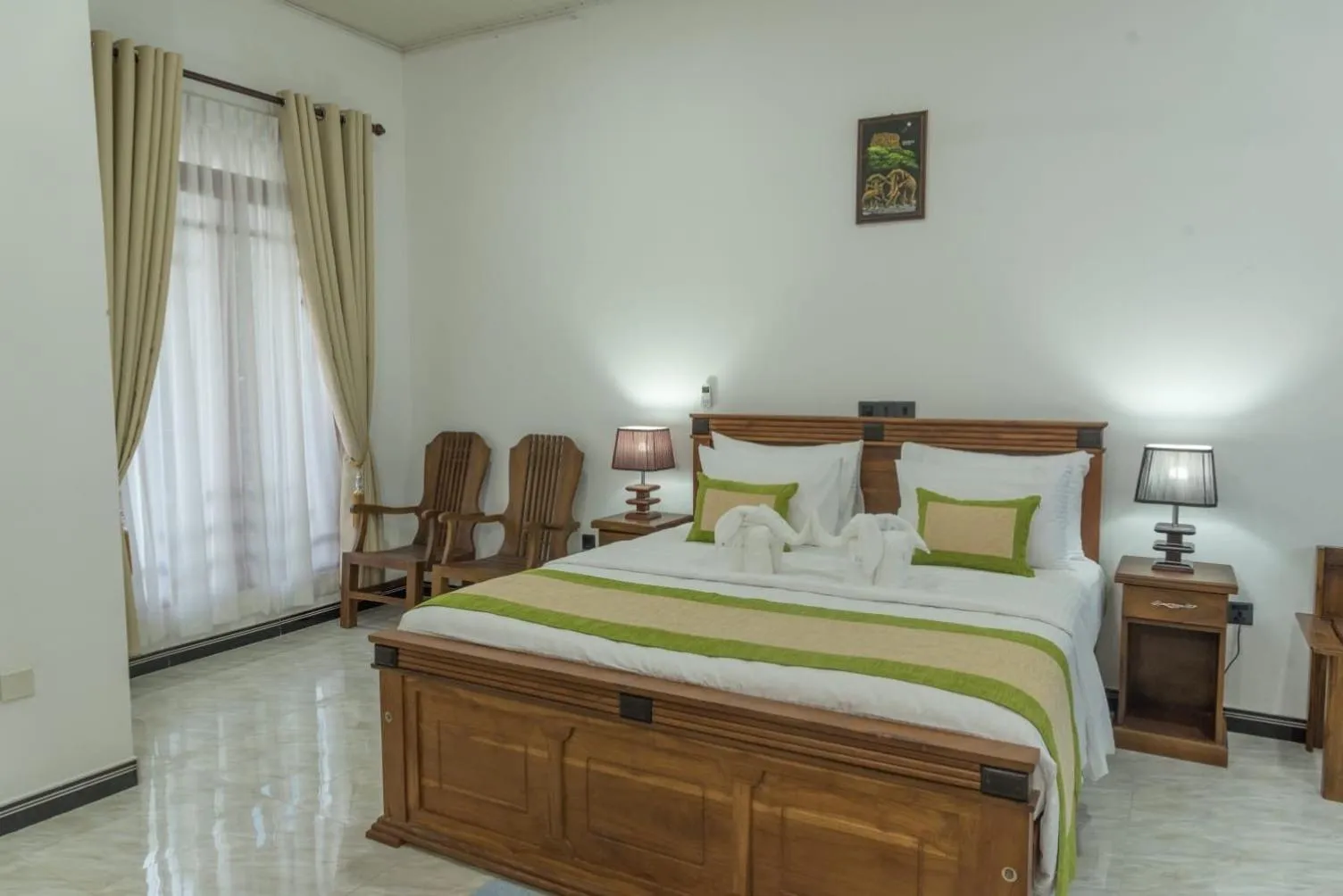 Bed in L S Lanka Hotel Dambulla