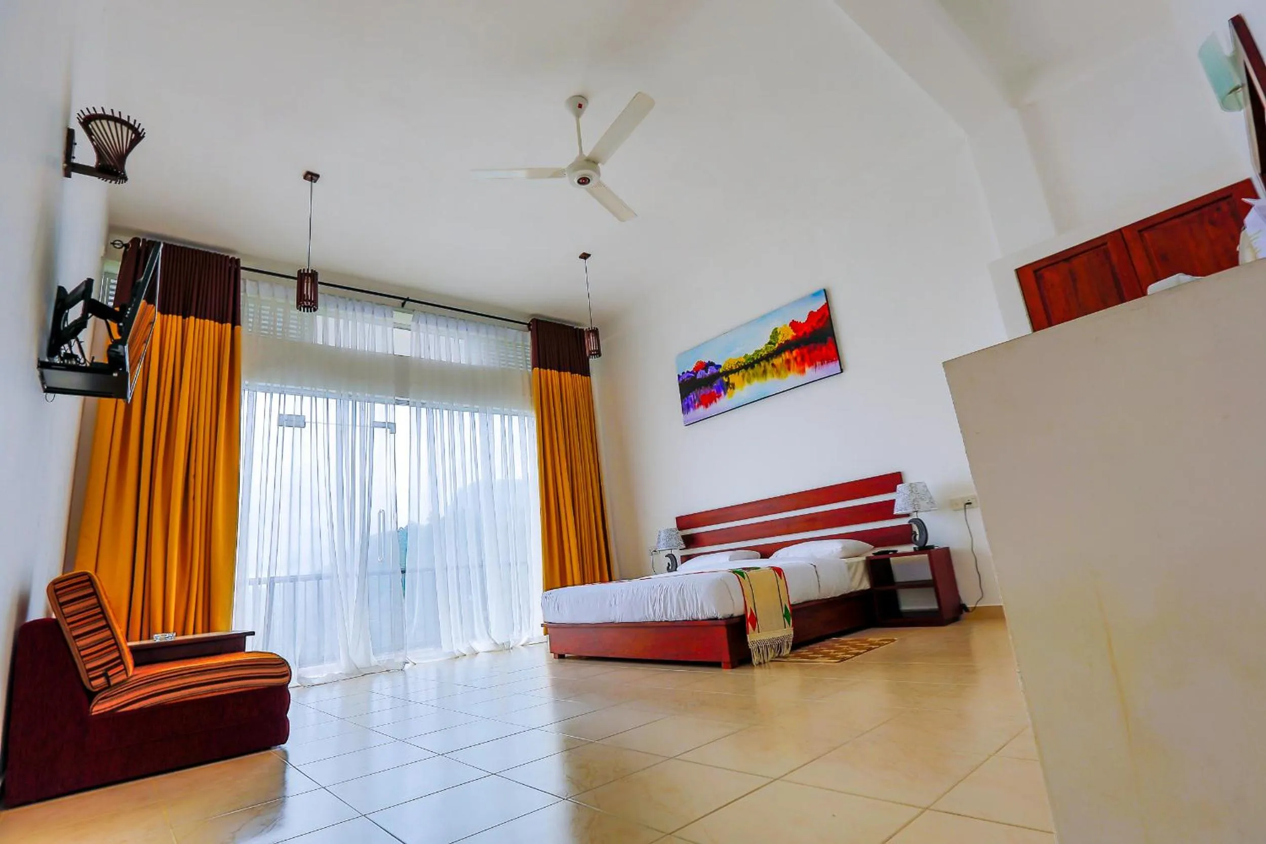 Seating area, Bed in Thuruliya Hotel