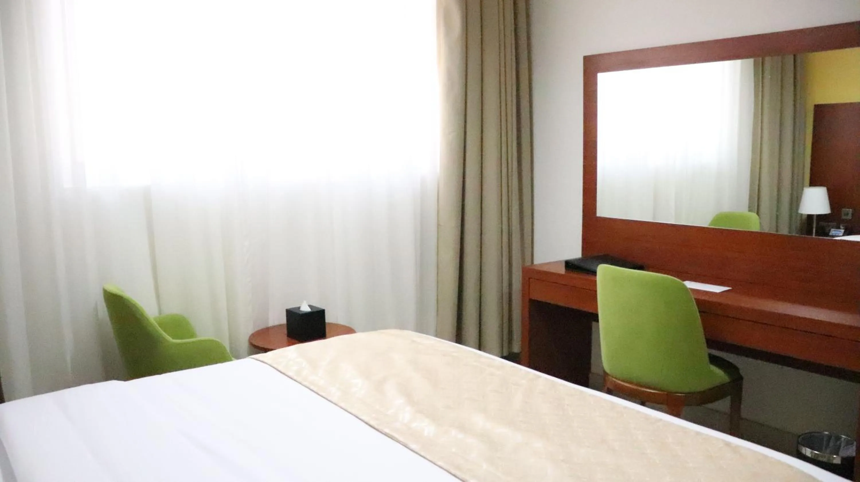 Bed in Al Riyadh Hotel Apartments