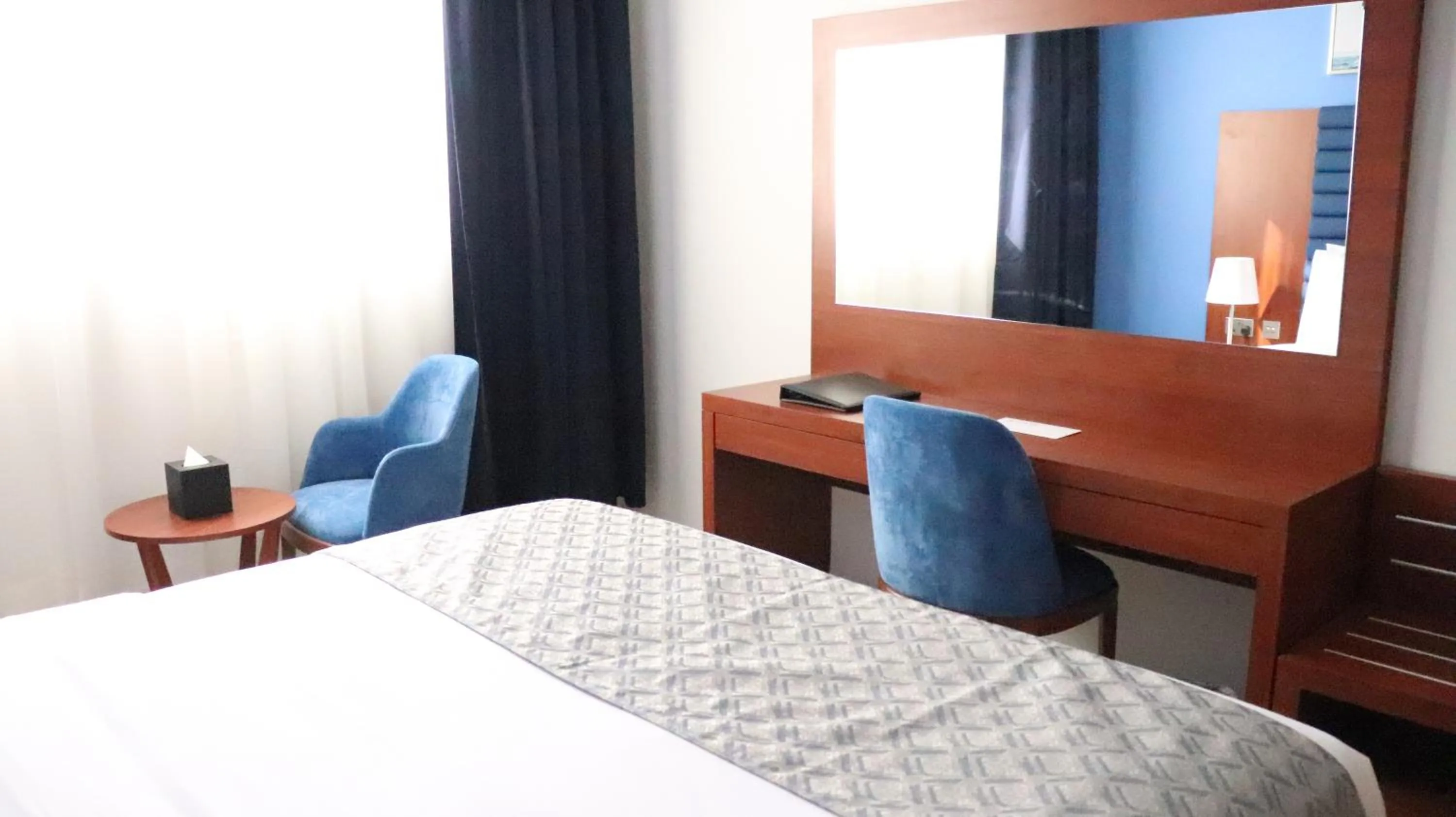 Bed in Al Riyadh Hotel Apartments