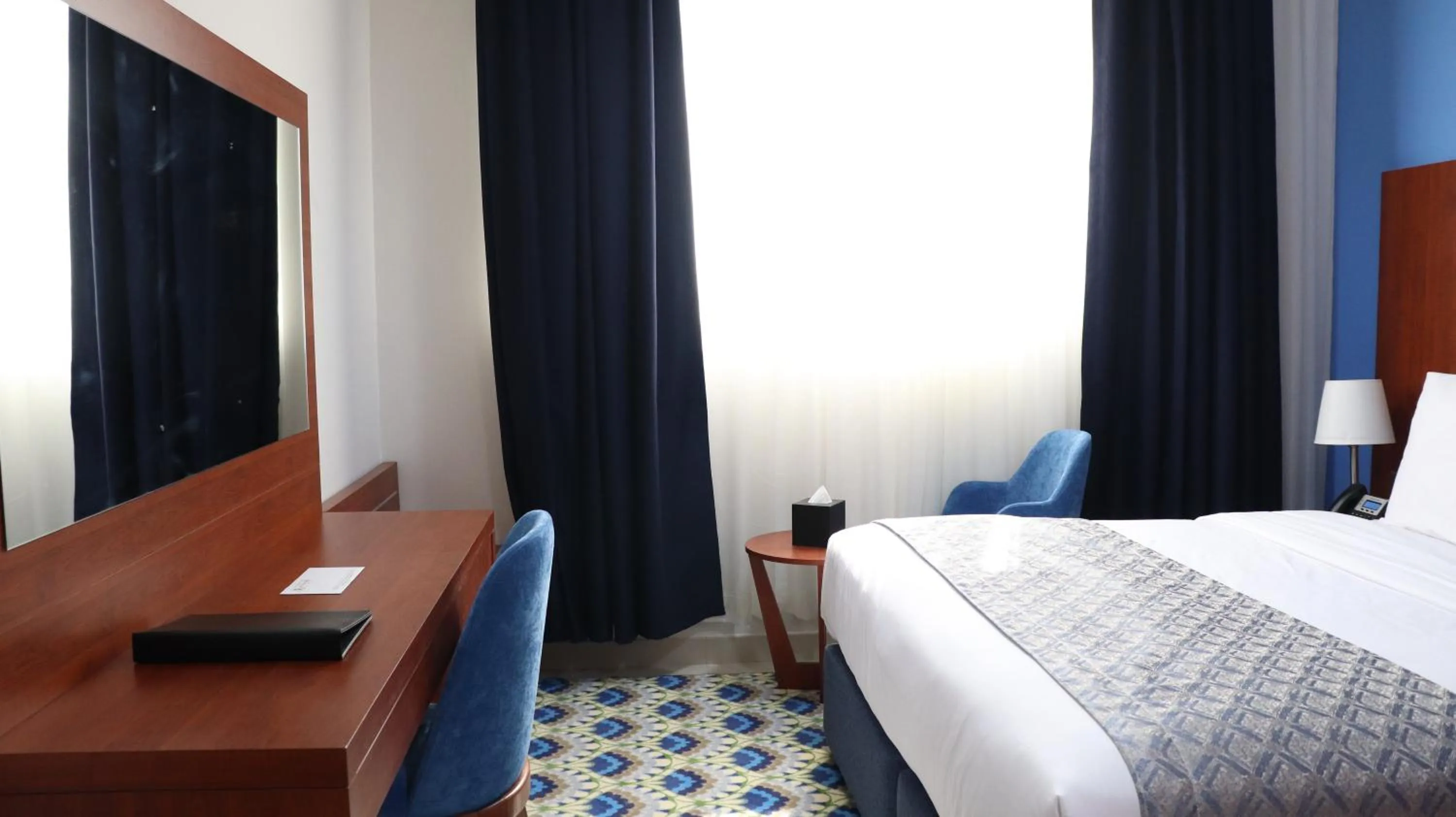 Bed in Al Riyadh Hotel Apartments