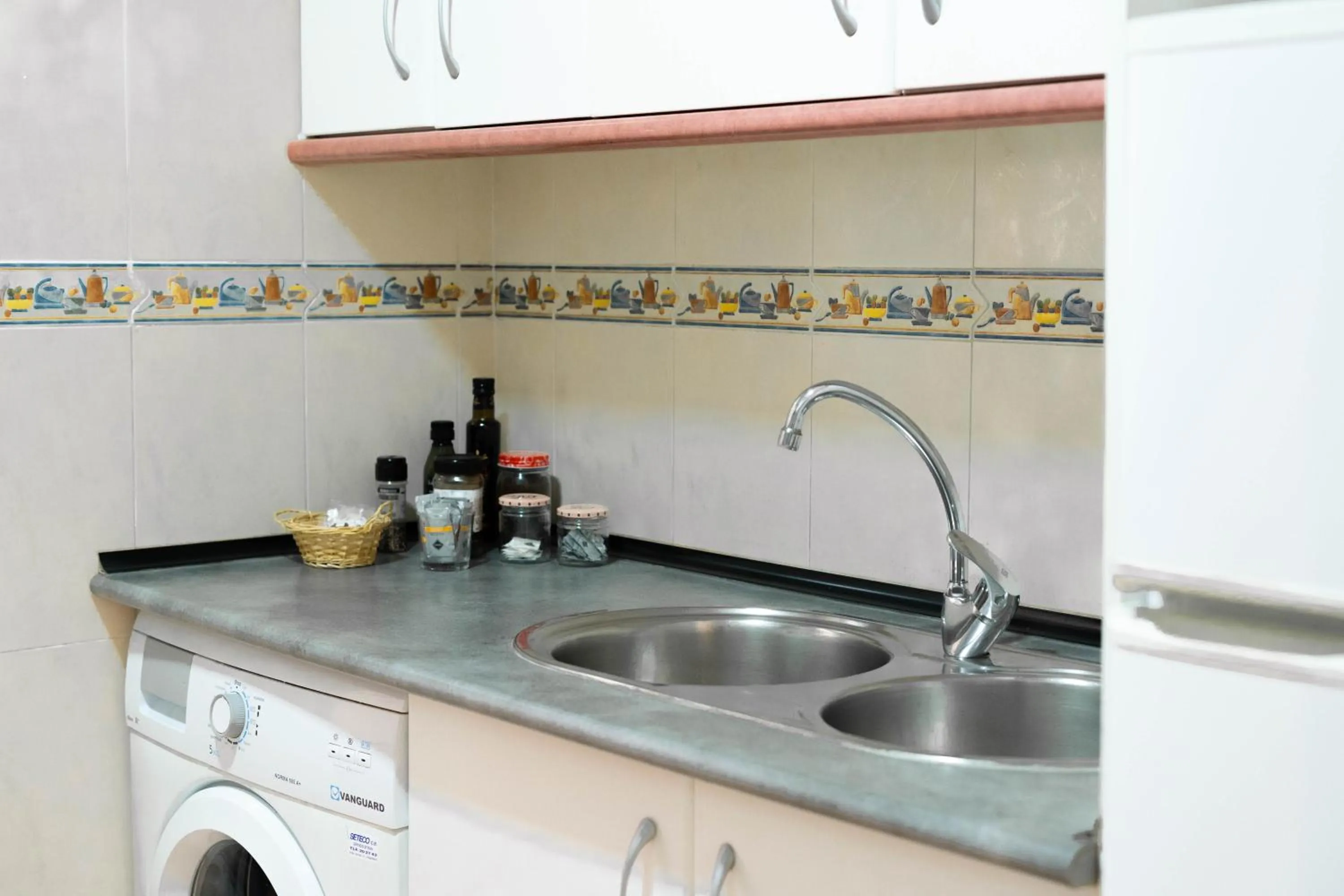 Kitchen or kitchenette in Apartamentos Granata