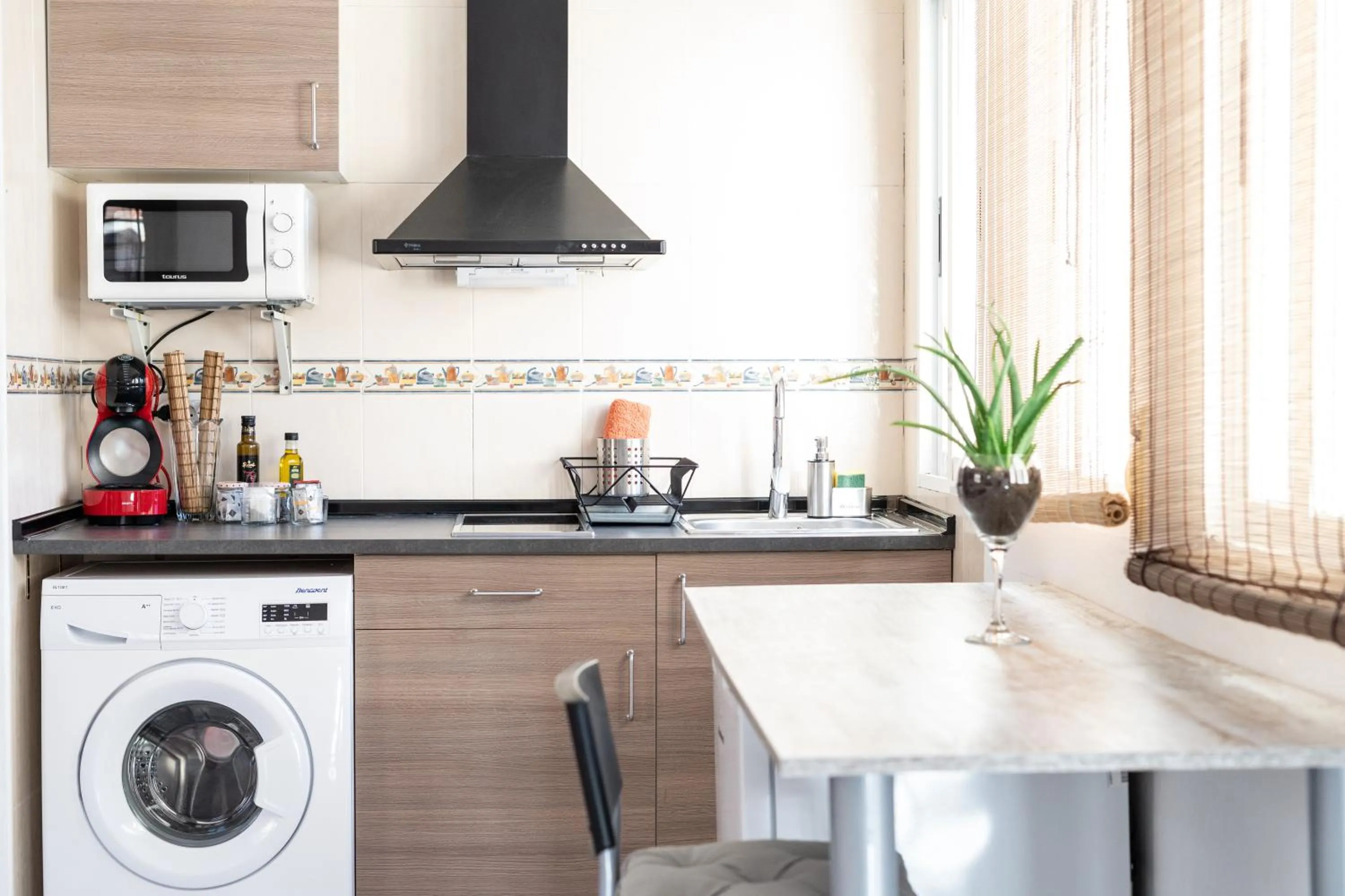 Kitchen or kitchenette in Apartamentos Granata