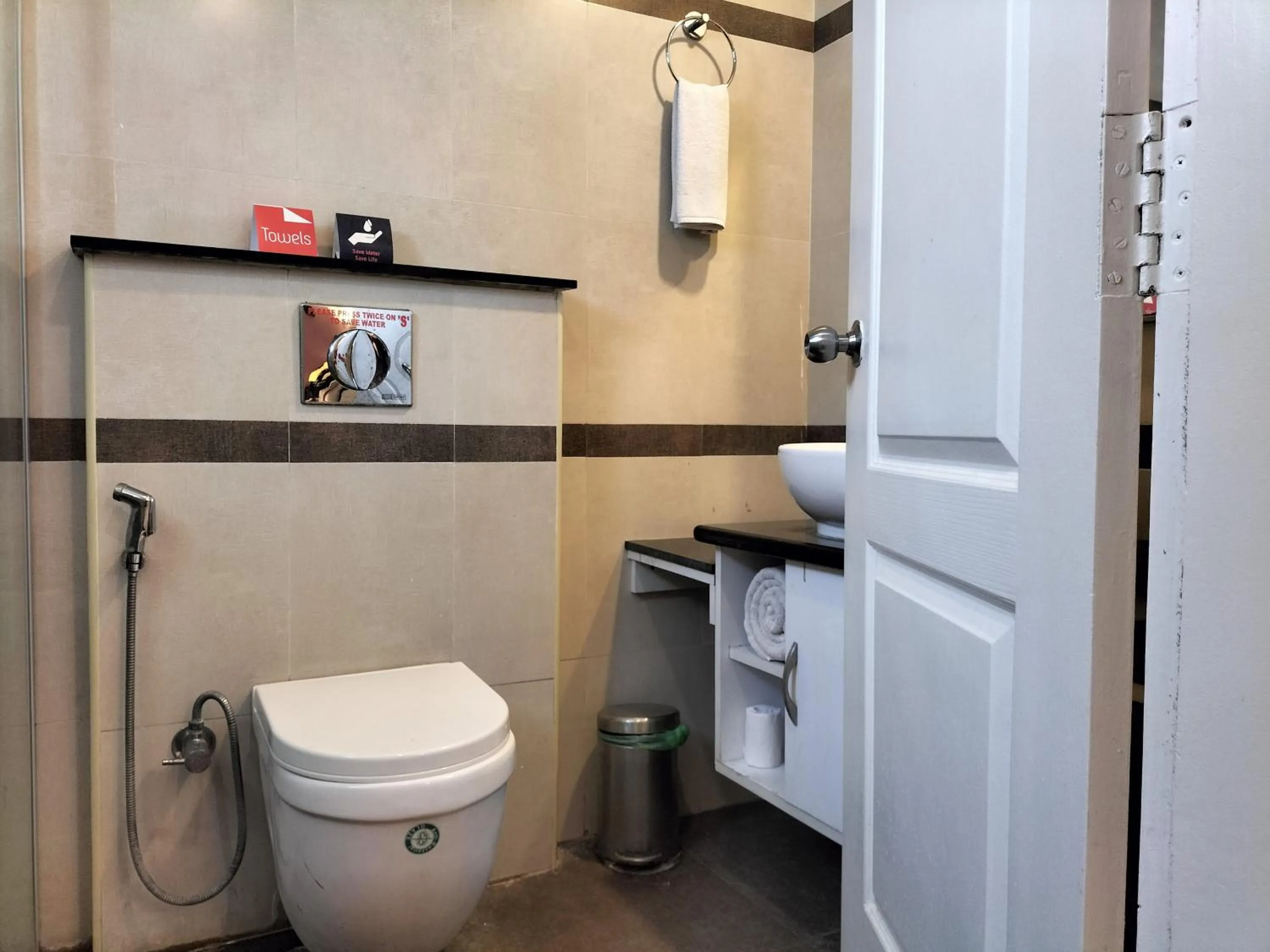 Toilet in Zip By Spree Hotels Surabi International Vellore