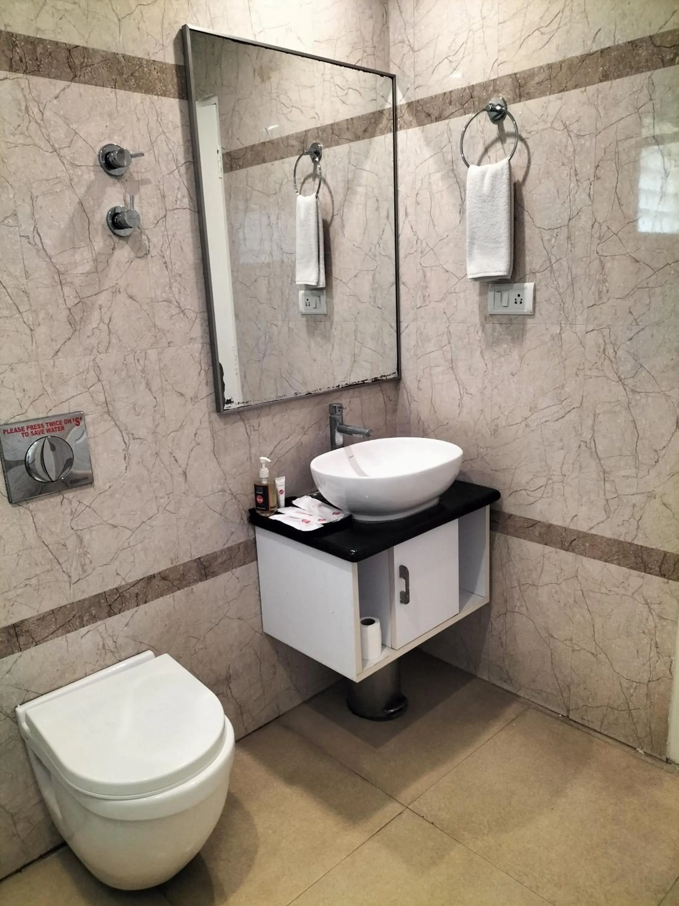 Shower in Zip By Spree Hotels Surabi International Vellore