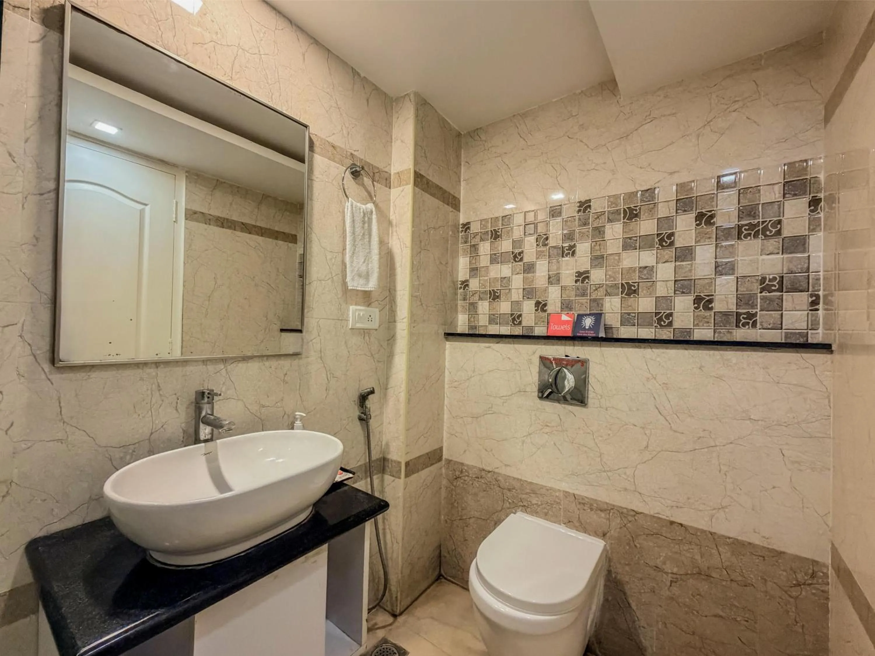 Shower in Zip By Spree Hotels Surabi International Vellore