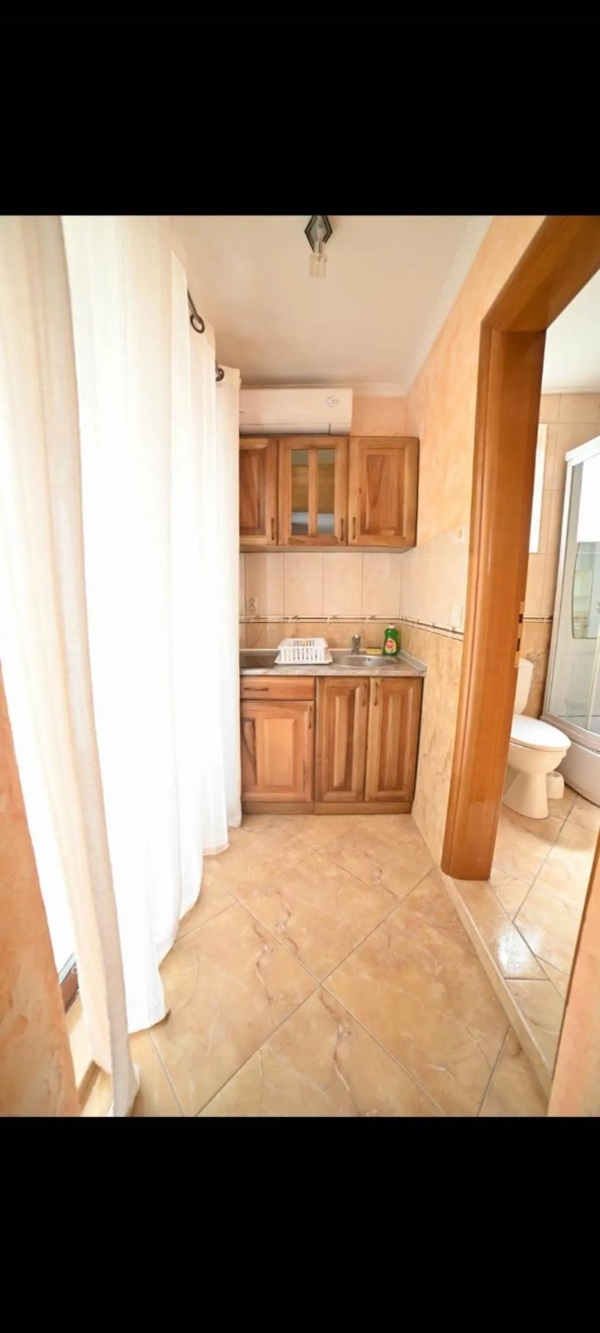 Kitchen or kitchenette in Villa M