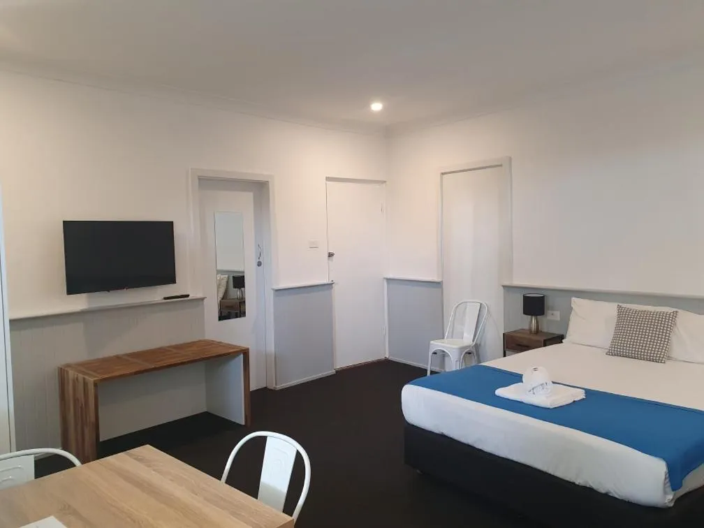 Bed in Squid's Ink Motel