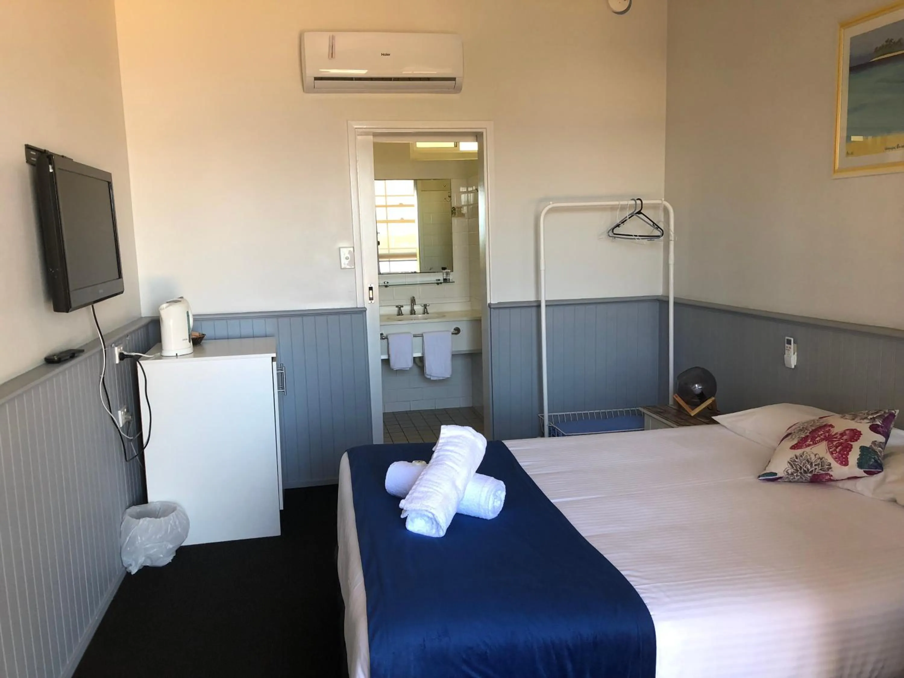 Bed in Squid's Ink Motel