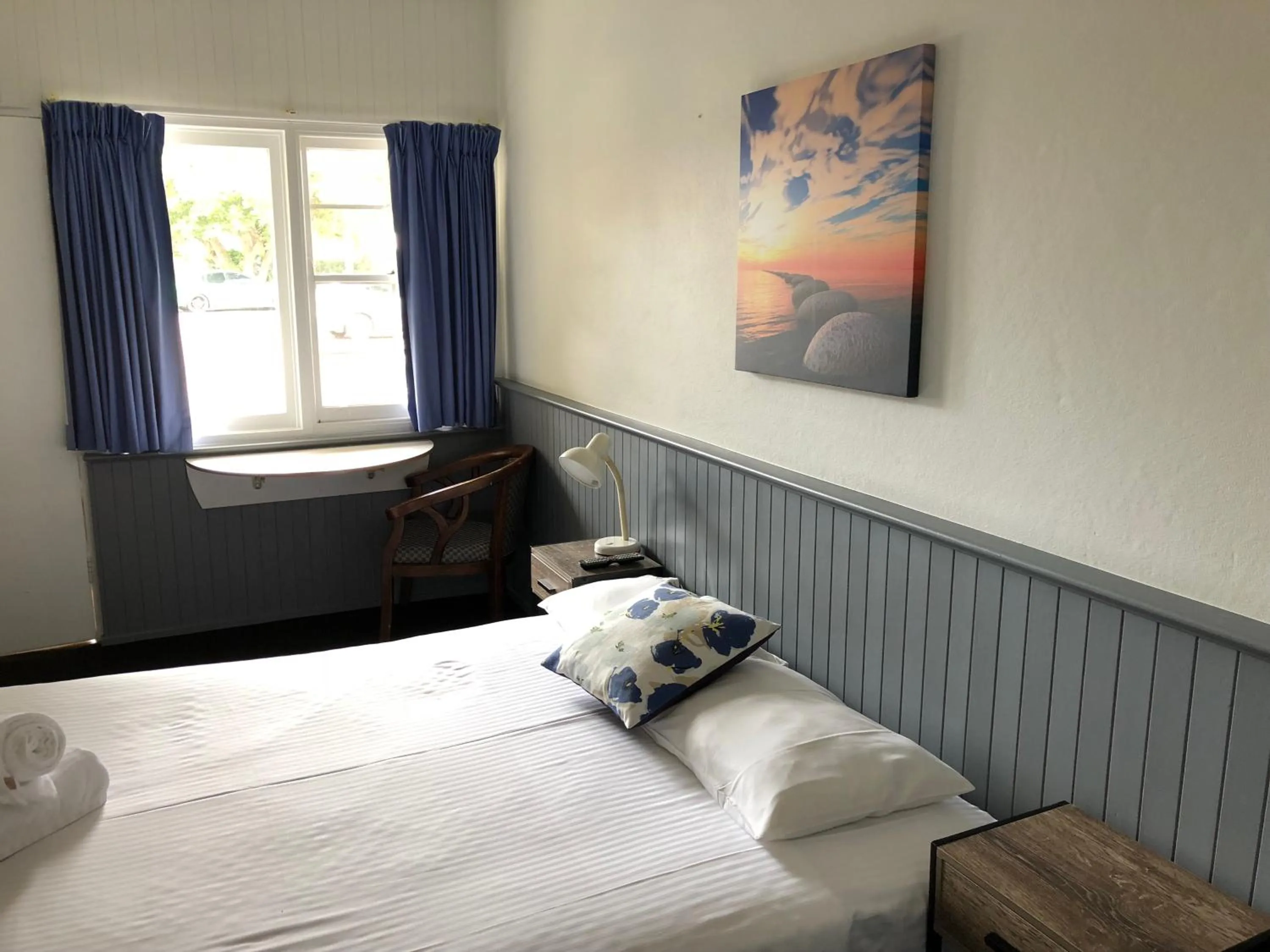 Bed in Squid's Ink Motel