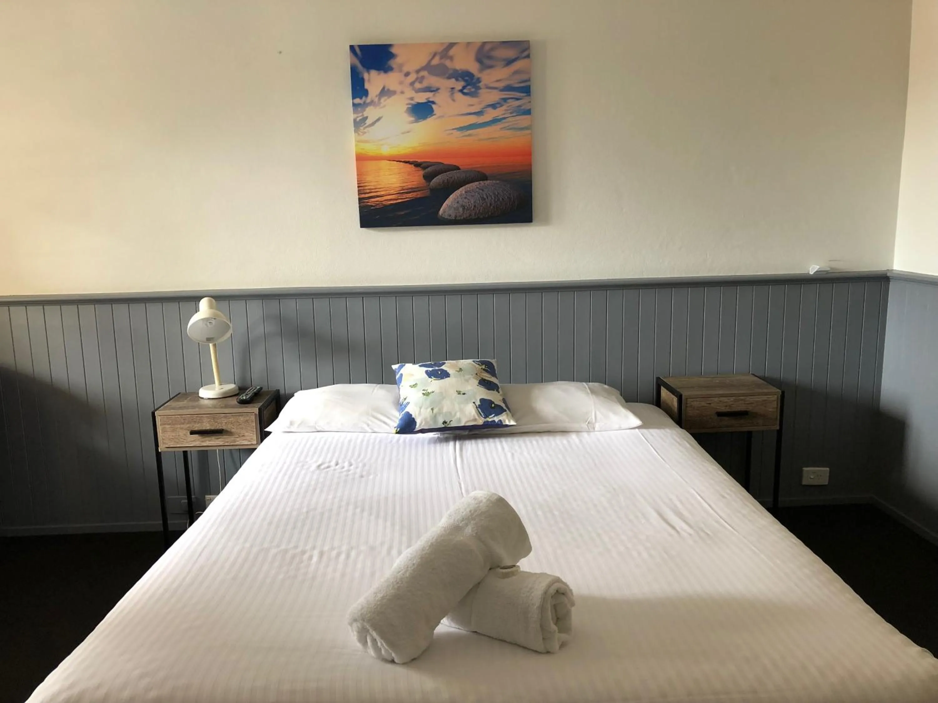 Bed in Squid's Ink Motel