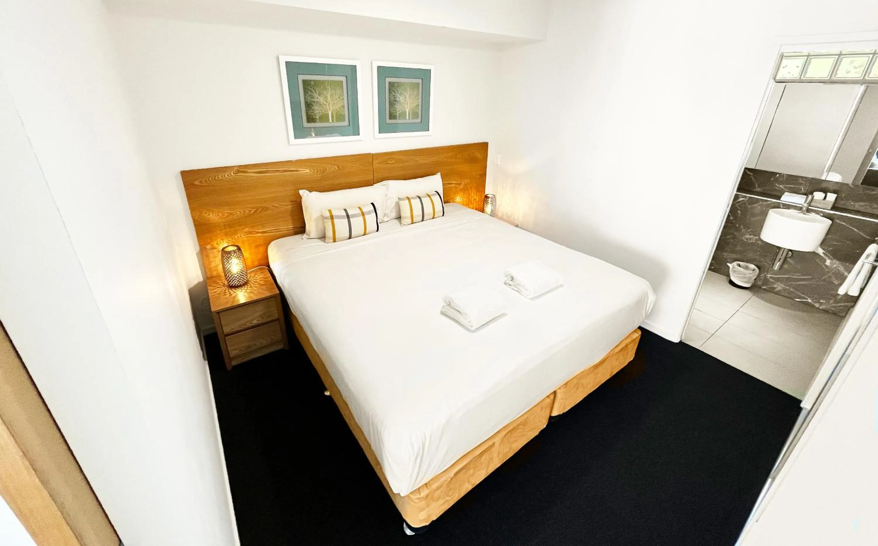 Bed in Oshen Holiday Apartments Yeppoon