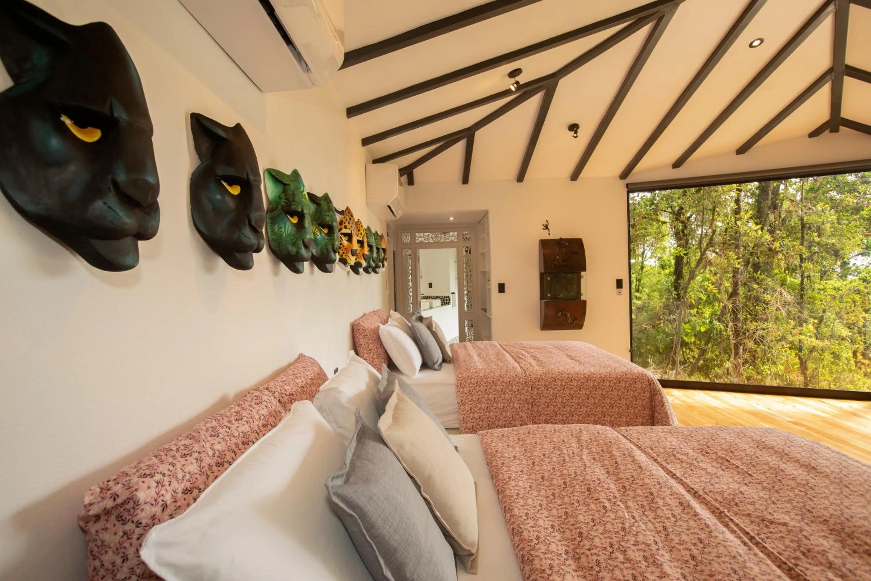 Bed in Dantica Cloud Forest Lodge