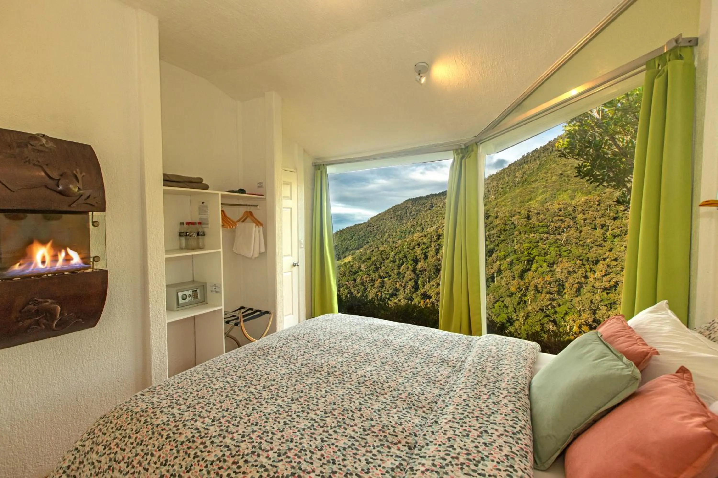 Bed in Dantica Cloud Forest Lodge