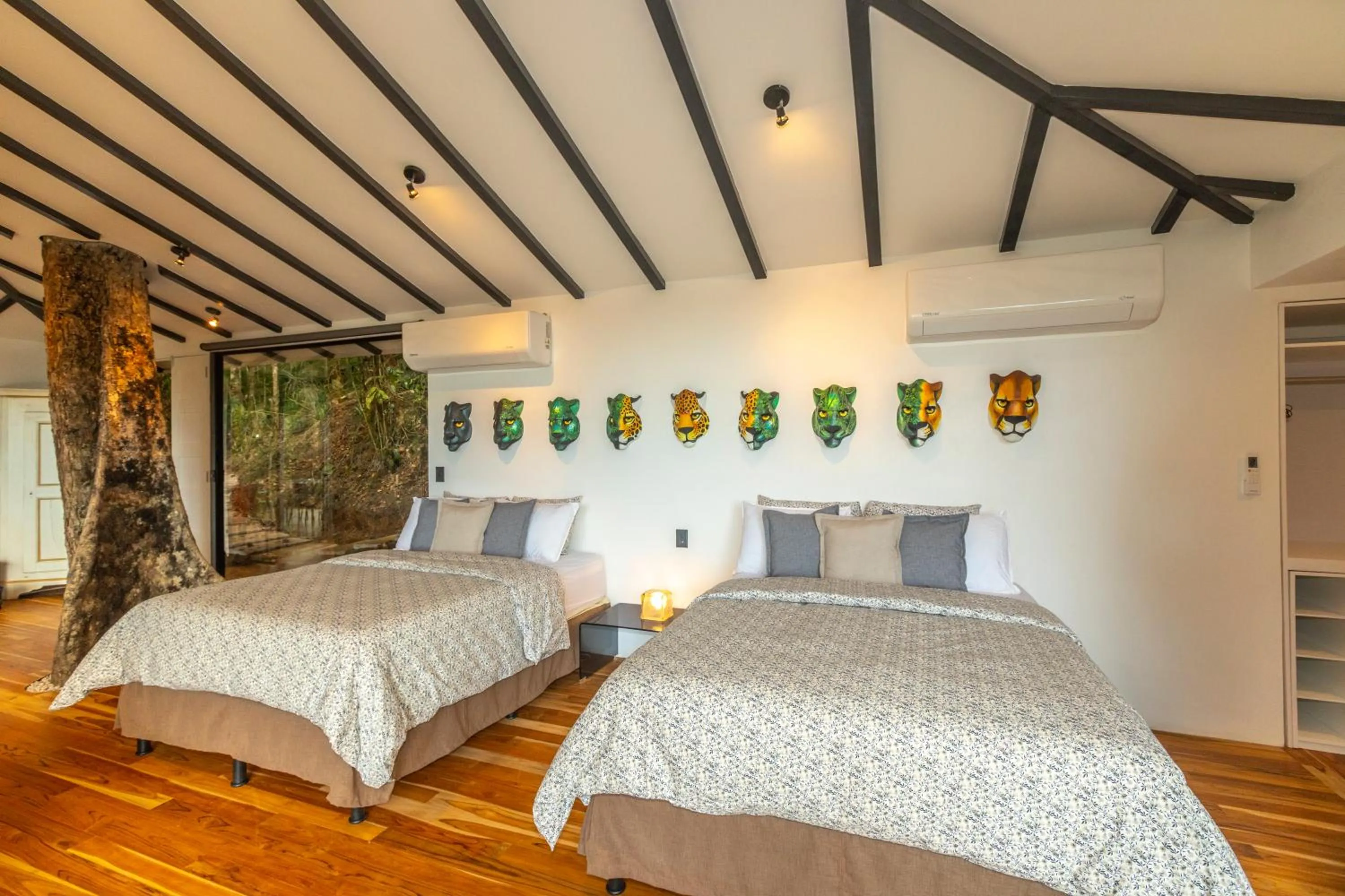 Bed in Dantica Cloud Forest Lodge