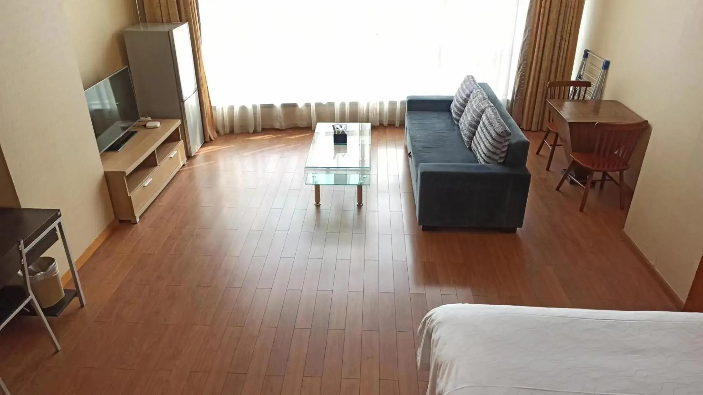 Seating area, Bed in East King Business Hotel (West Lake store, Hangzhou) Seating area, Bed in East King Business Hotel (West Lake store, Hangzhou)