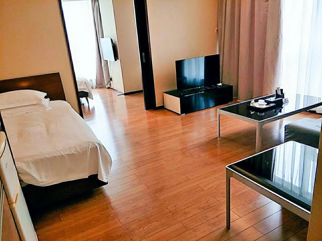 Seating area, Bed in East King Business Hotel (West Lake store, Hangzhou)