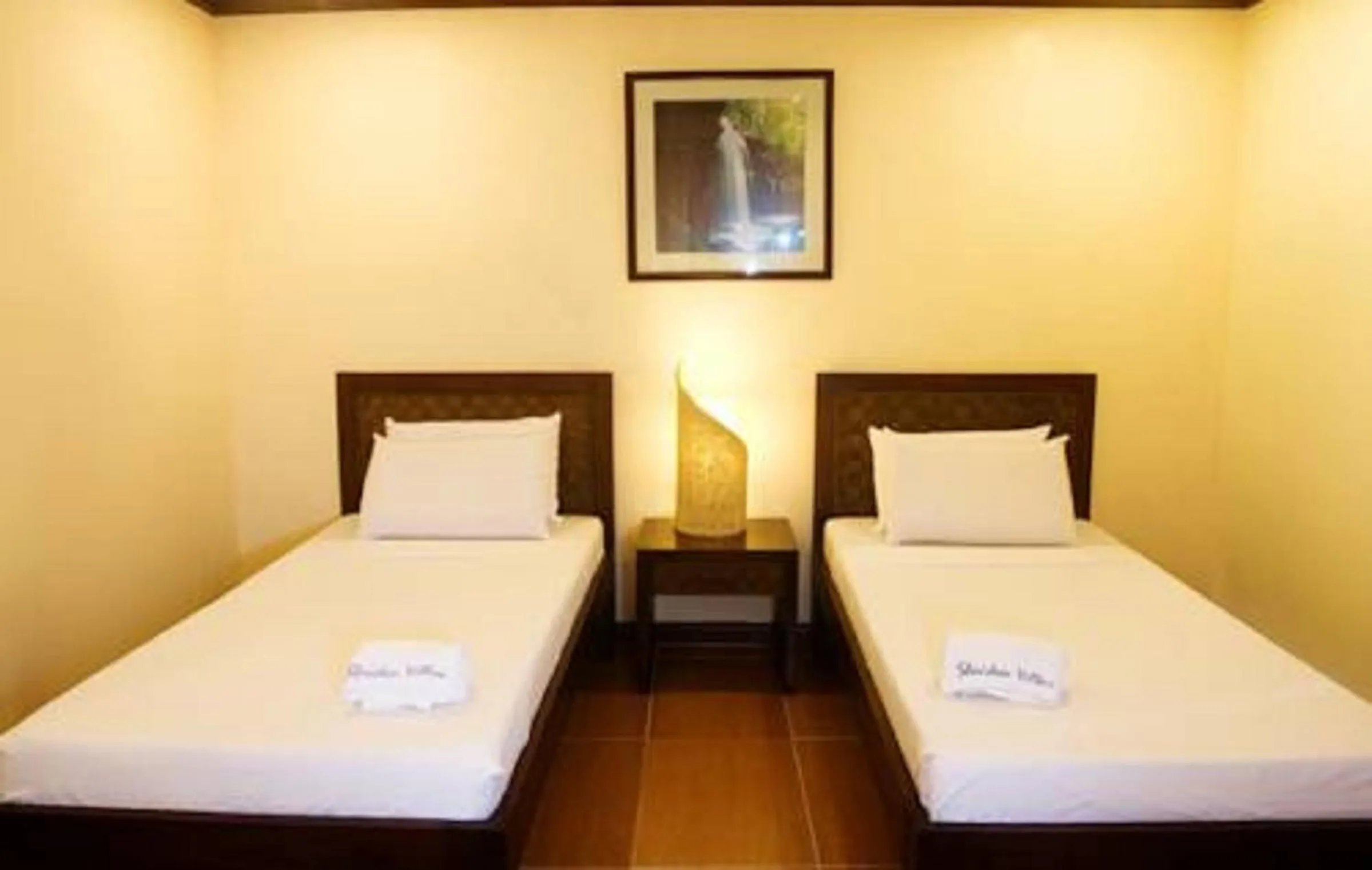 Bed in Sheridan Villas Boracay