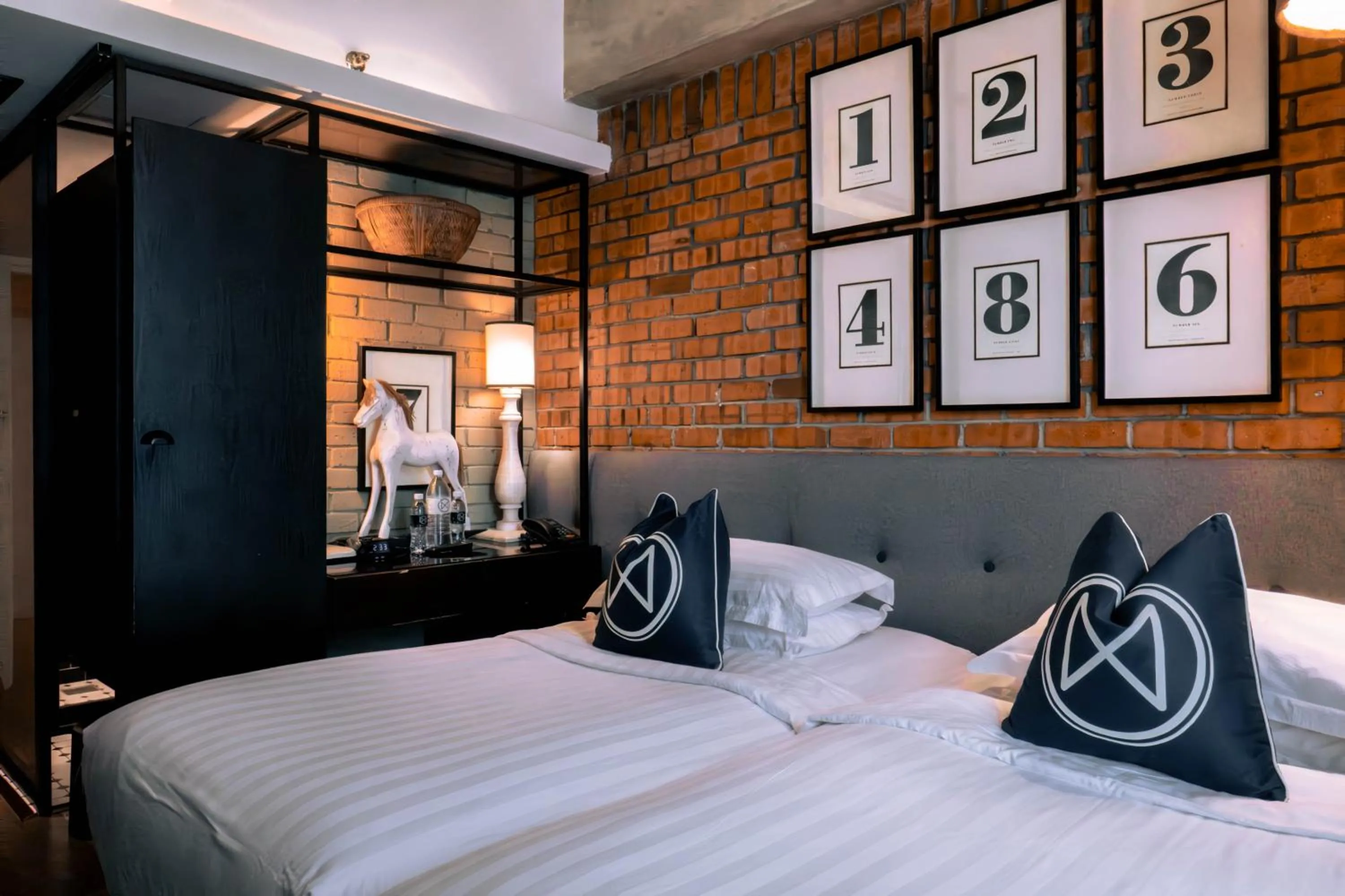 Bed in M Boutique Hotel