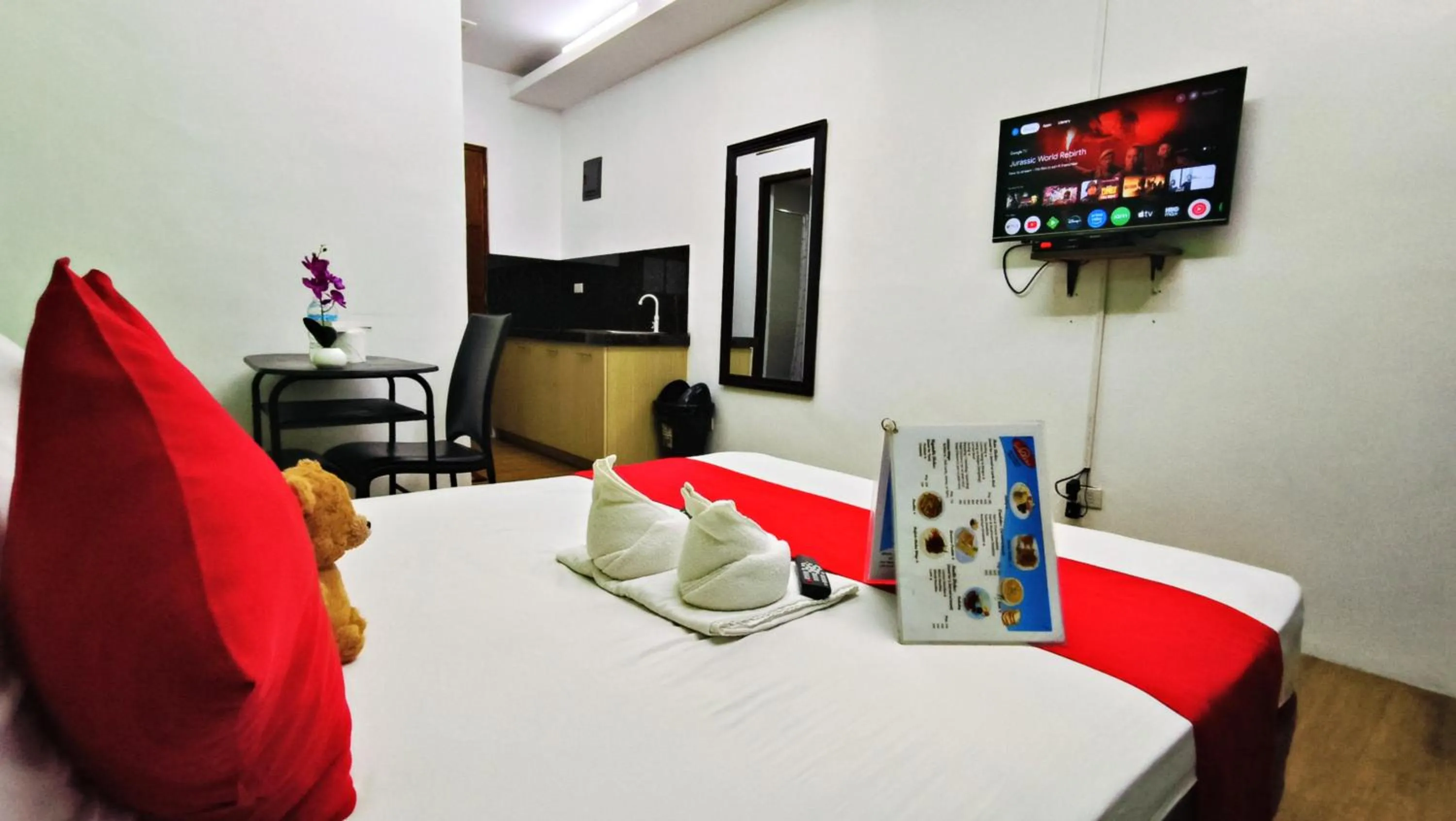 Bed in Spiral Suites Hotel