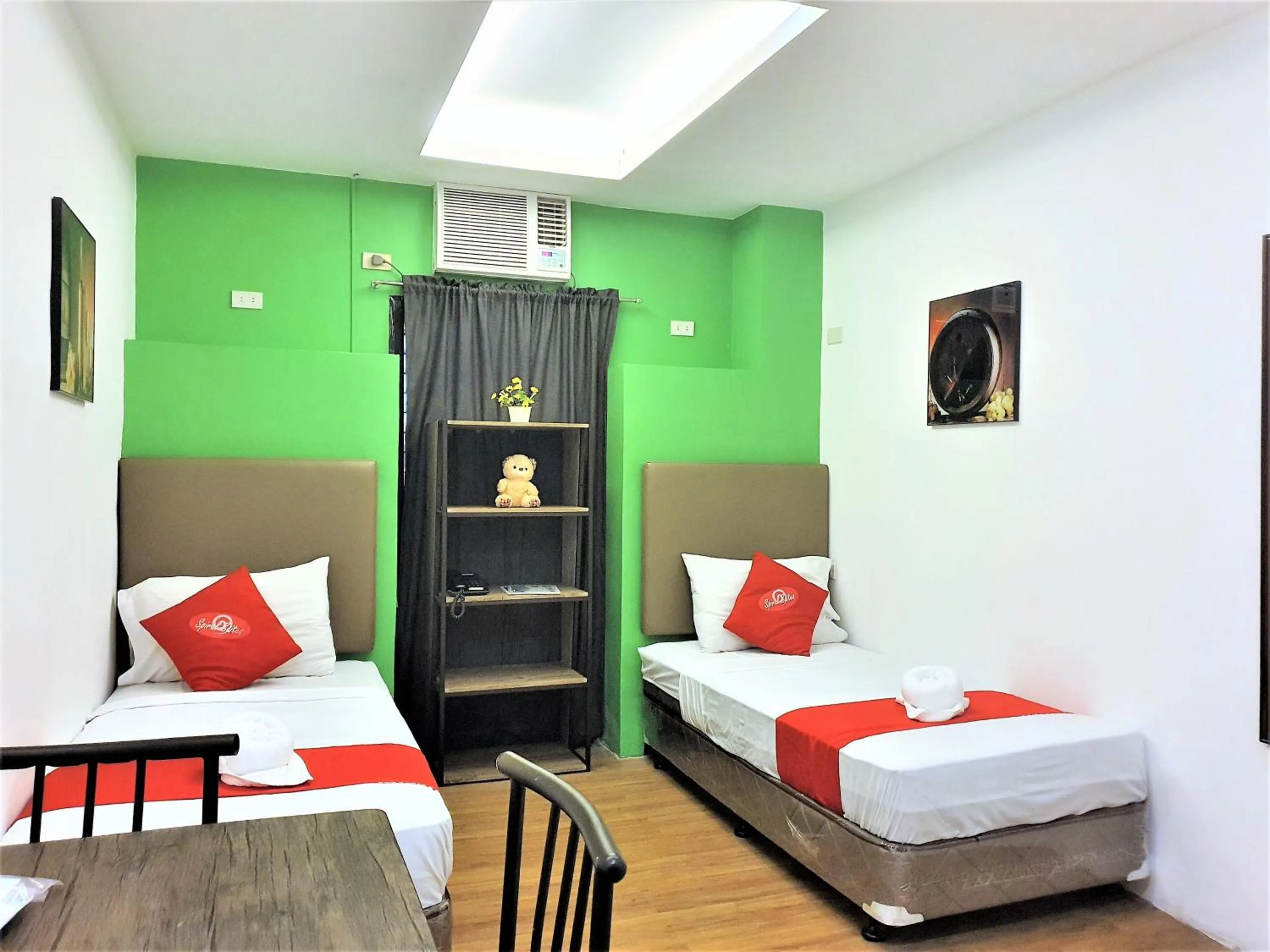 Bed in Spiral Suites Hotel