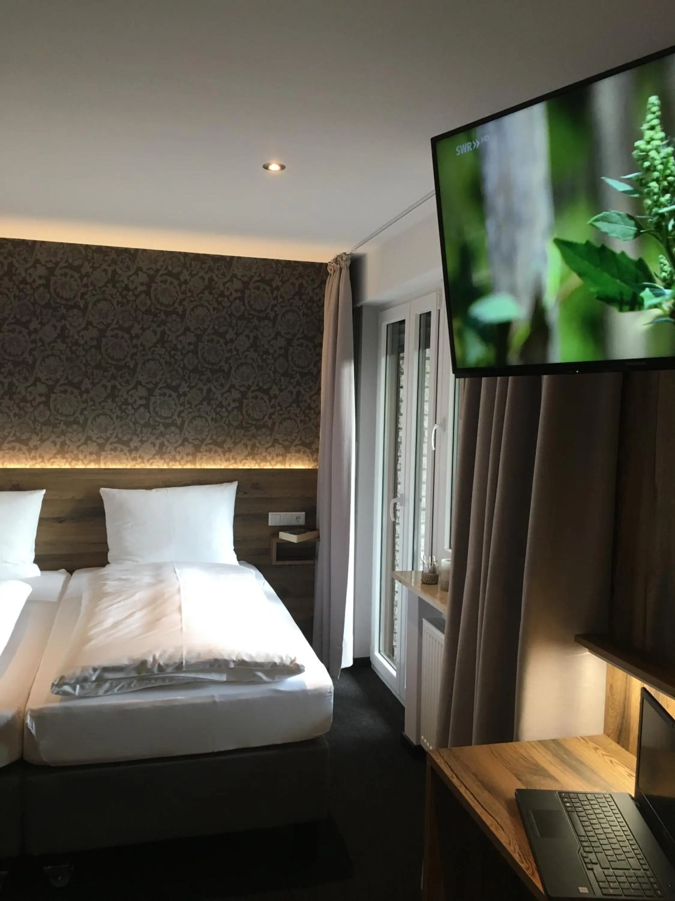 Photo of the whole room, Bed in Landhaus Hotel Göke