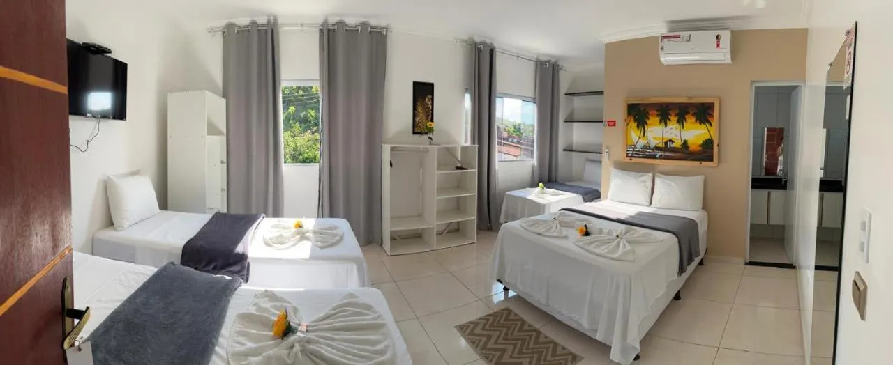 Bed in Pousada La Belle