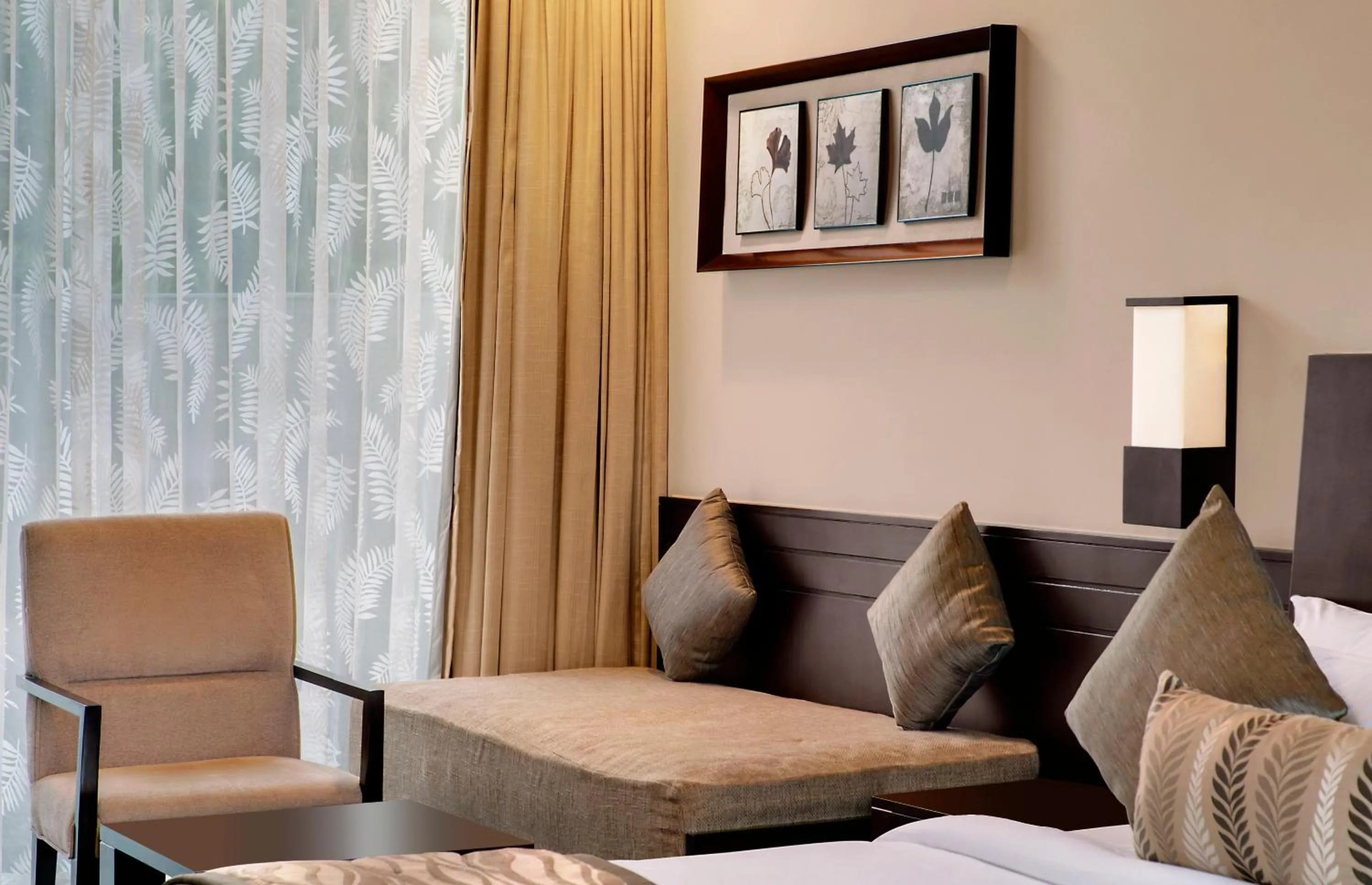 Seating area in Namah Resort Jim Corbett, a member of Radisson Individuals