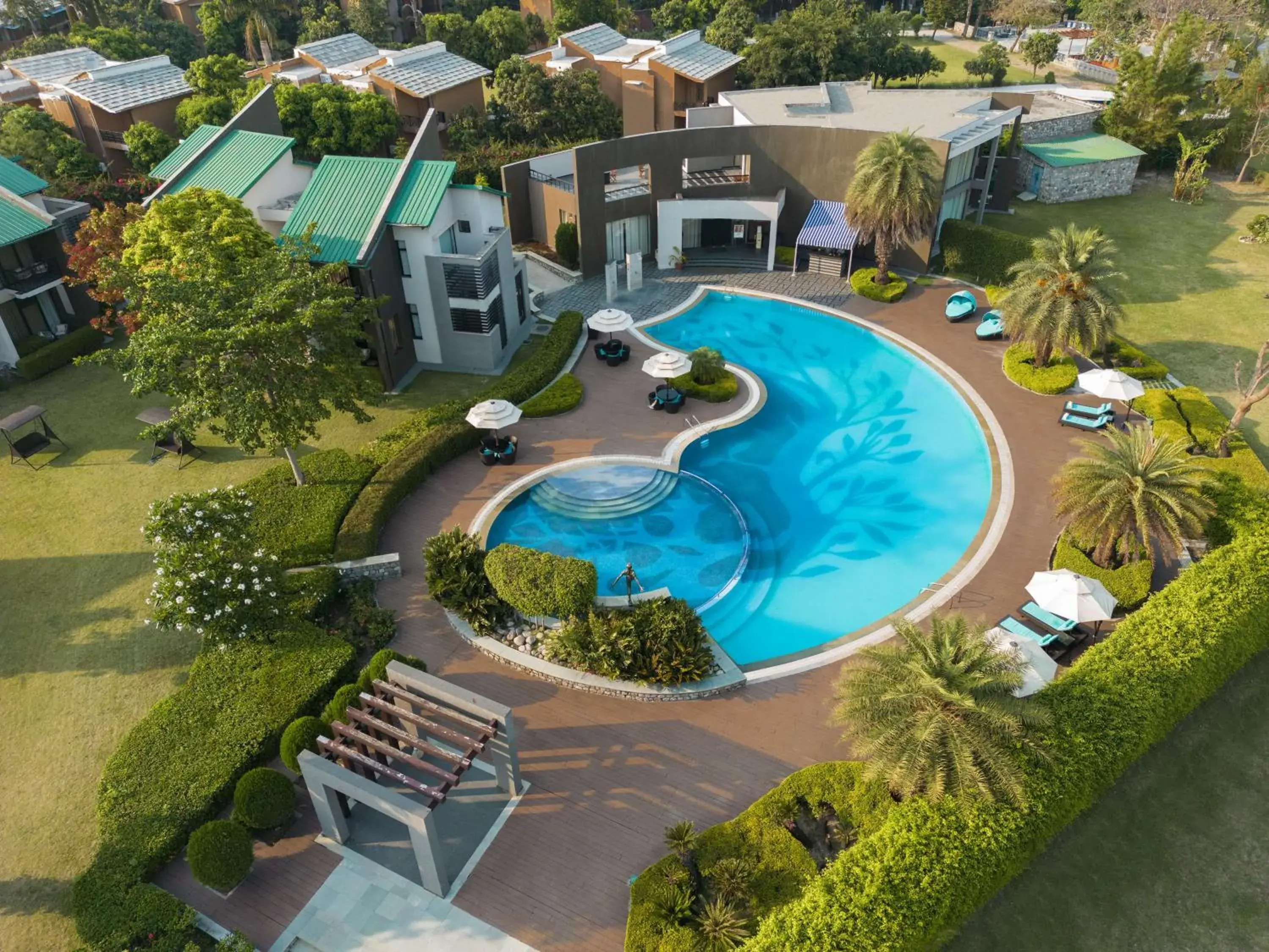 Pool view in Namah Resort Jim Corbett, a member of Radisson Individuals Pool view in Namah Resort Jim Corbett, a member of Radisson Individuals