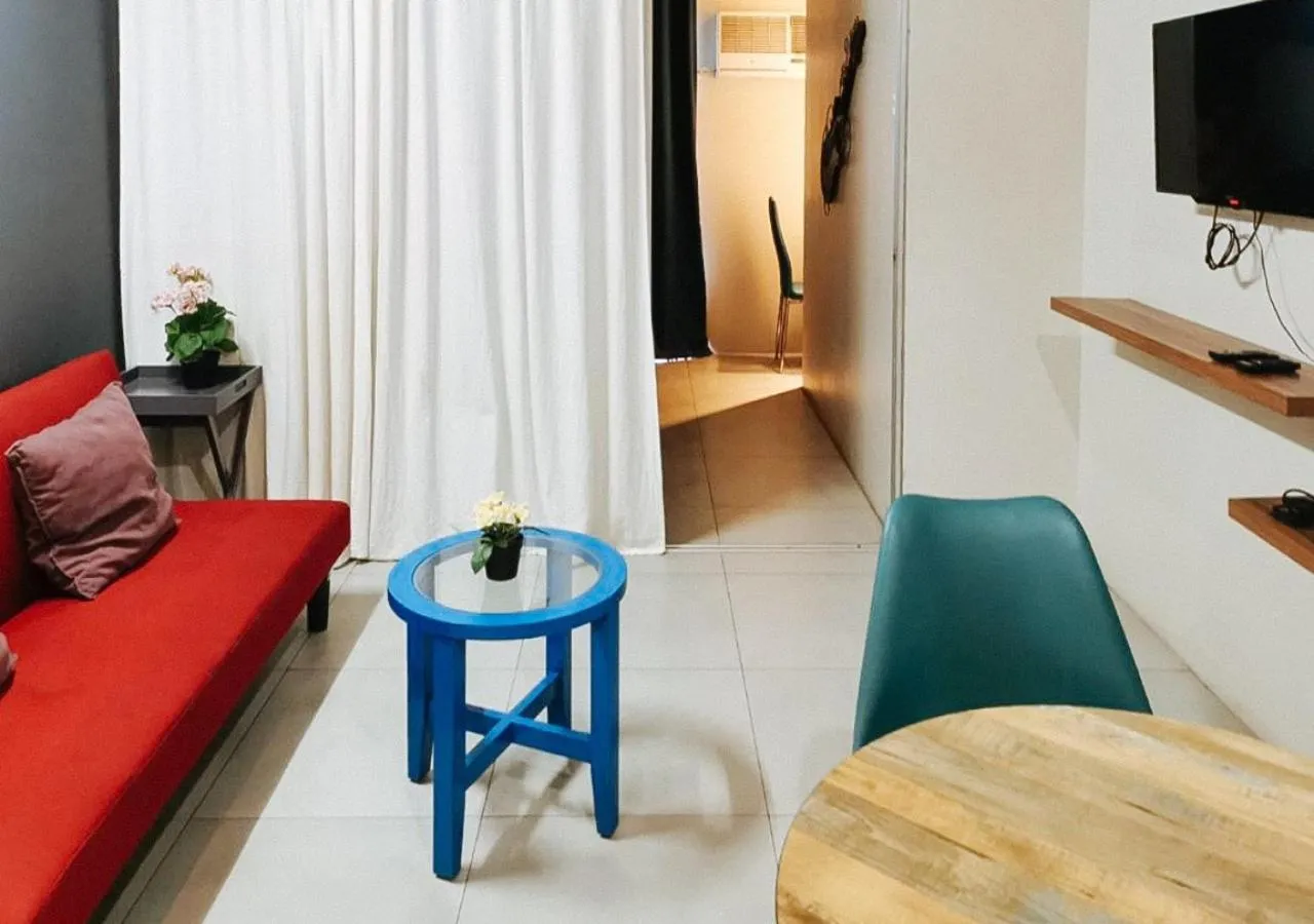 Bedroom, Seating Area in GMRENTALS Apartment at Mactan Airport